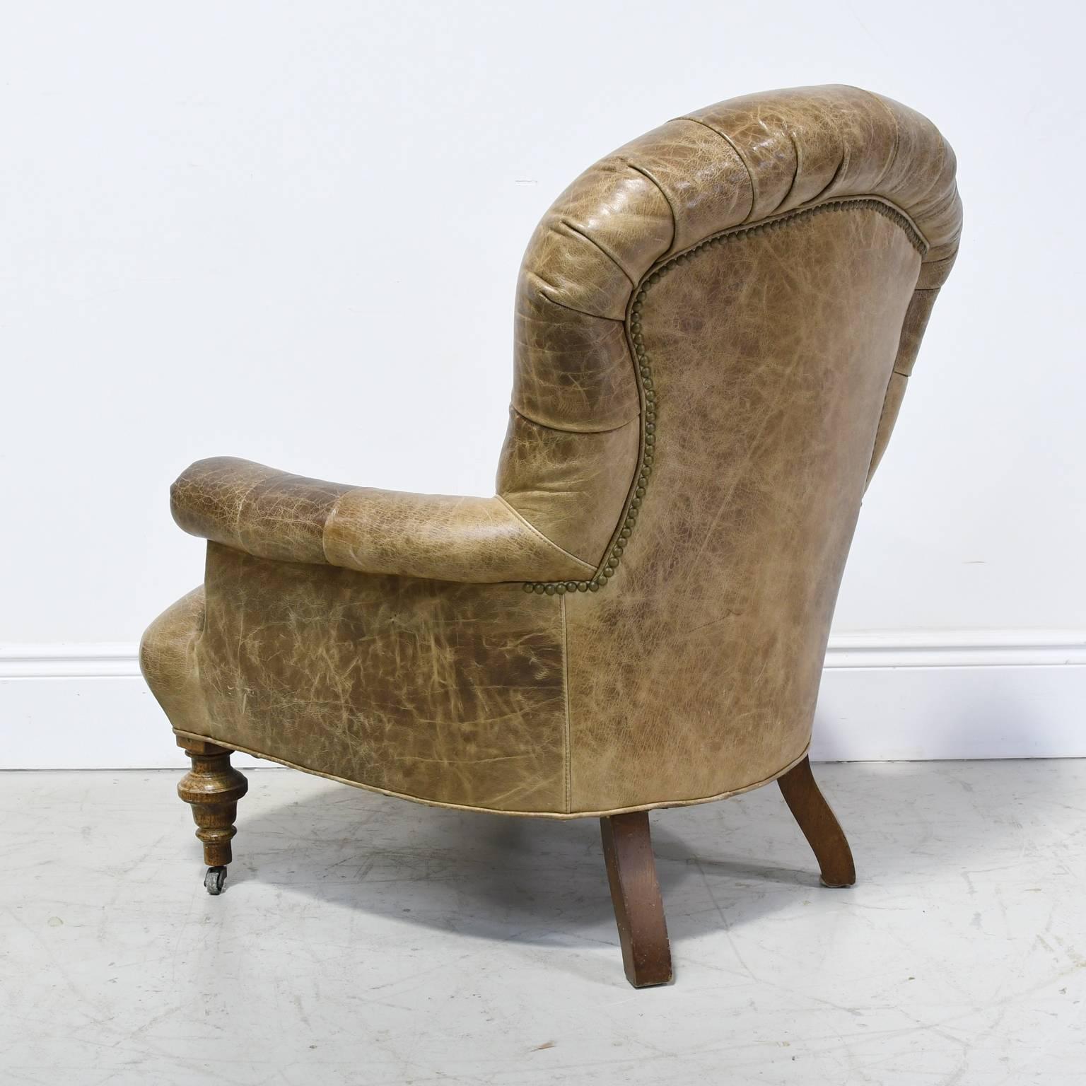 American Worn Brown Leather Club Chair with Scrolled Arms, Tufted Back and Turned Feet