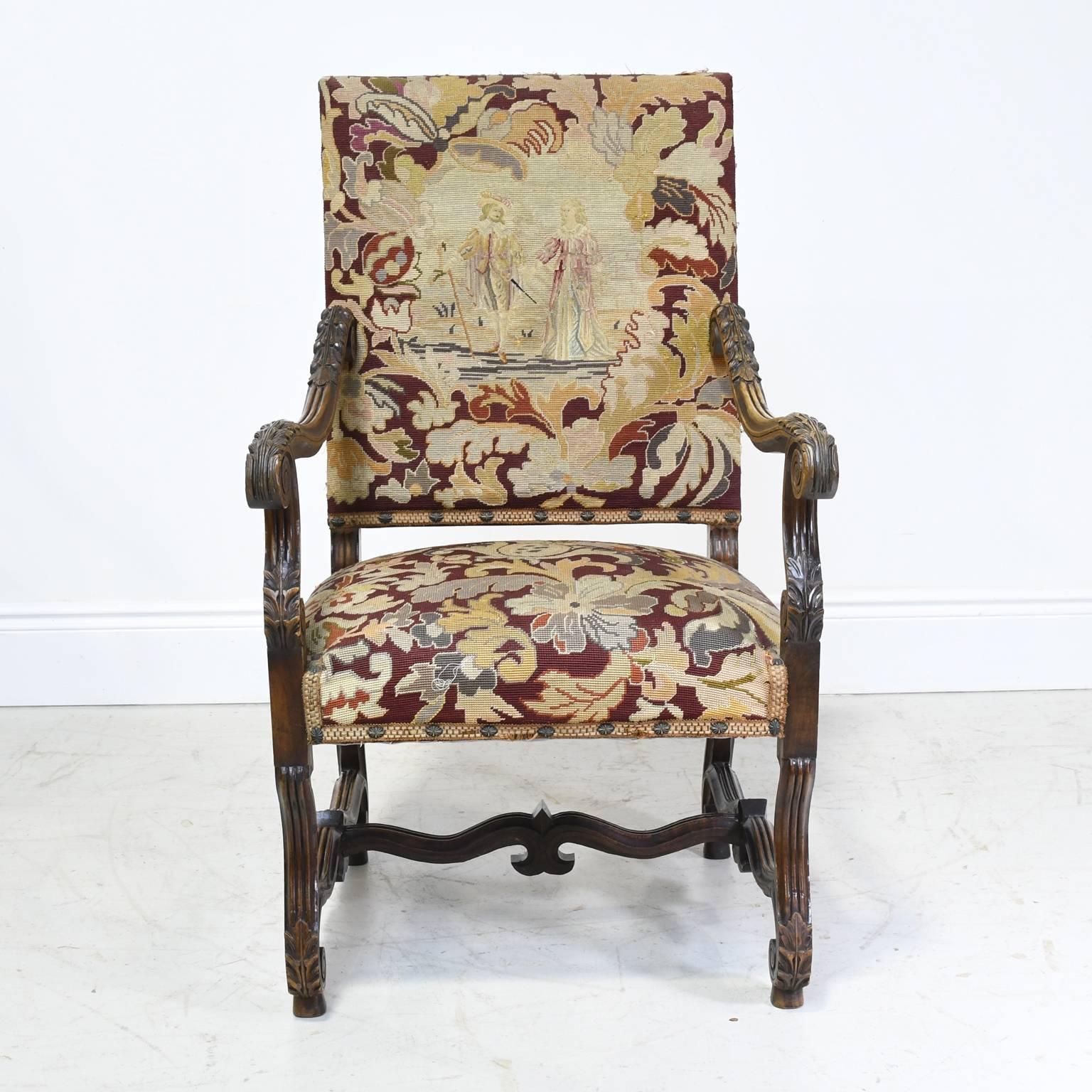 A pair of late 19th century throne chairs in oak in the Louis XIII style with carved acanthus-leaf on scrolled arms & feet, and 