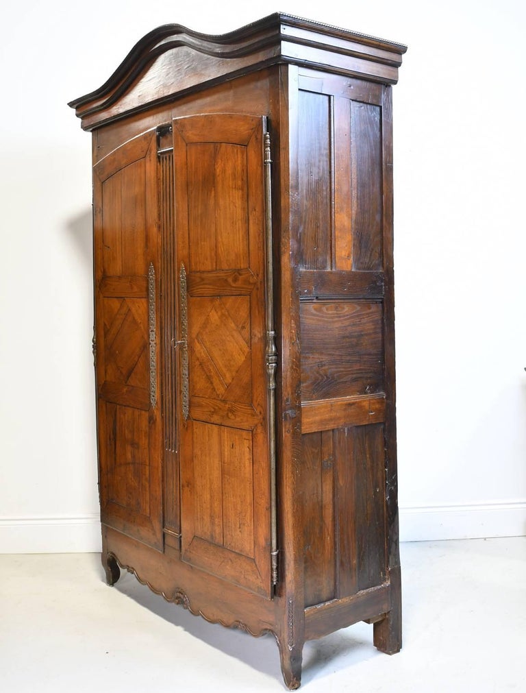 Early 19th Century Country French Armoire in Solid Walnut with Arched