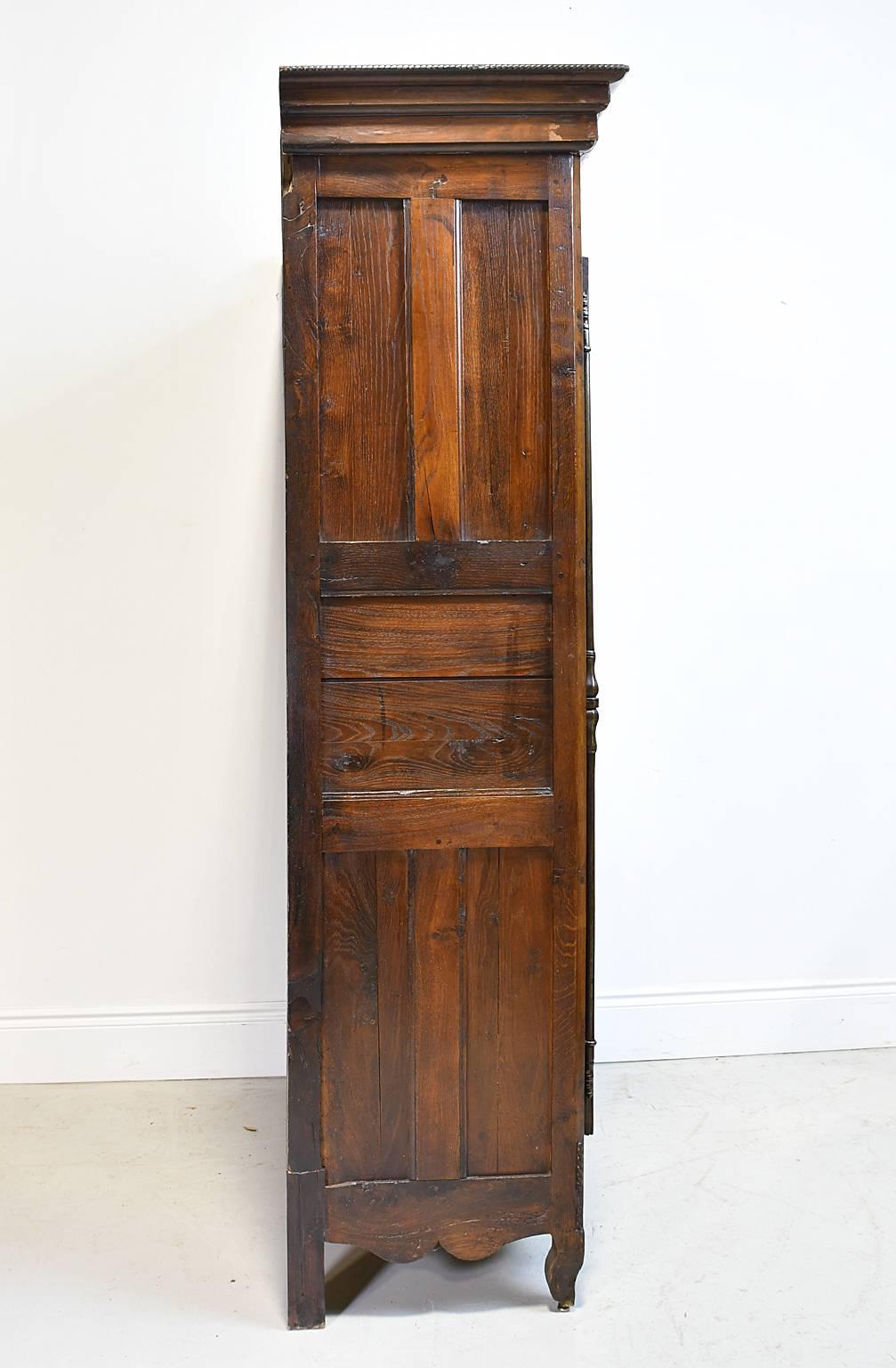 French Provincial 18th Century Country French Armoire in Walnut with Arched Bonnet For Sale