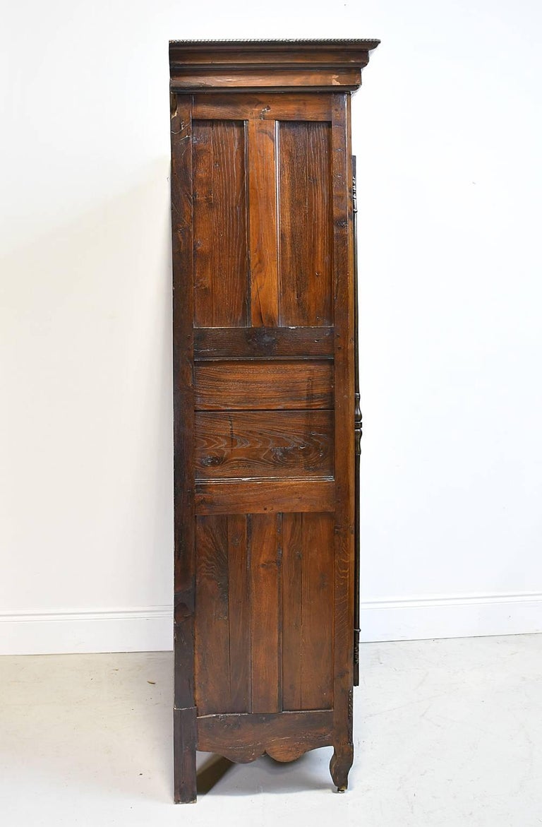 Steel 18th Century Country French Armoire in Walnut with Arched Bonnet For Sale