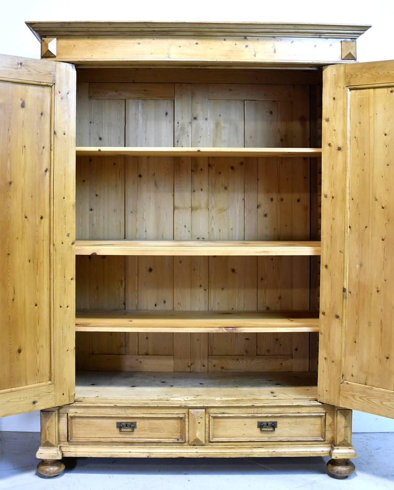 19th Century European Two Door Armoire In Pine With Drawers And This Lovely Honey Colored Pine Armoire From The Grunderzeit Period In Germany Circa 1880 S