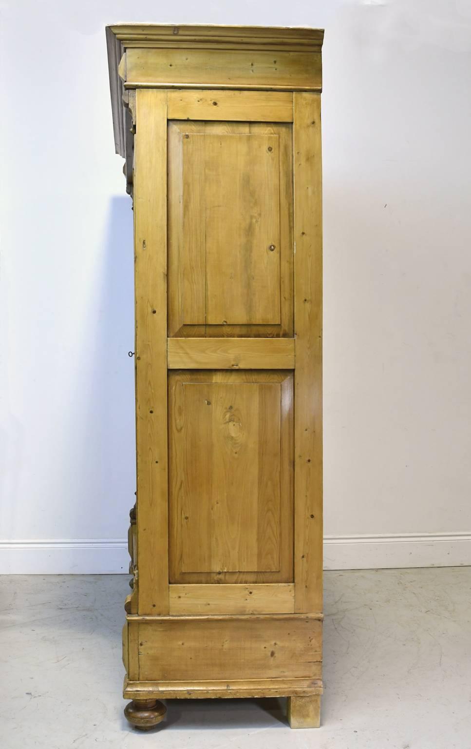 Carved 19th Century European Two-Door Armoire in Pine with Drawers & Interior Shelves