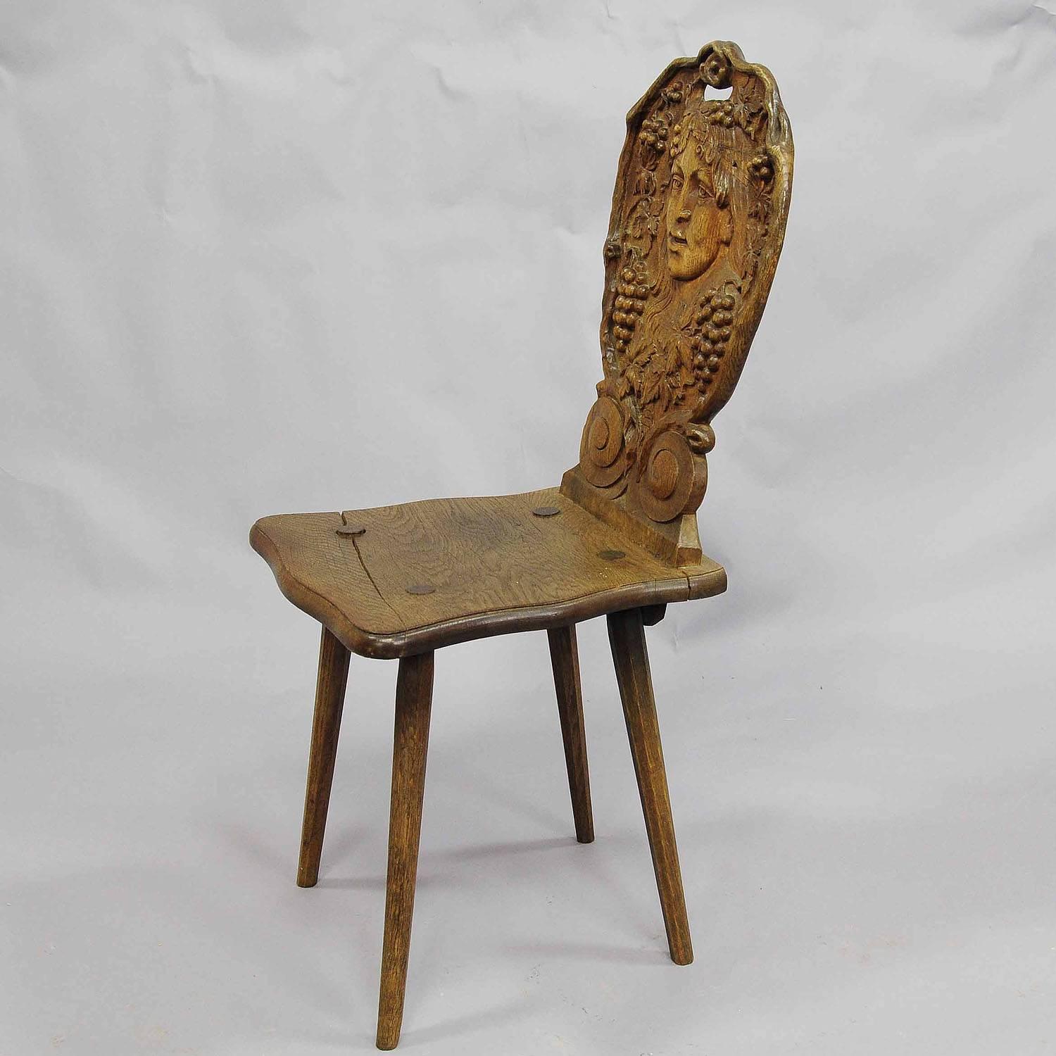 Black Forest Carved Wedding Board Chair with Wine Queen, circa 1900