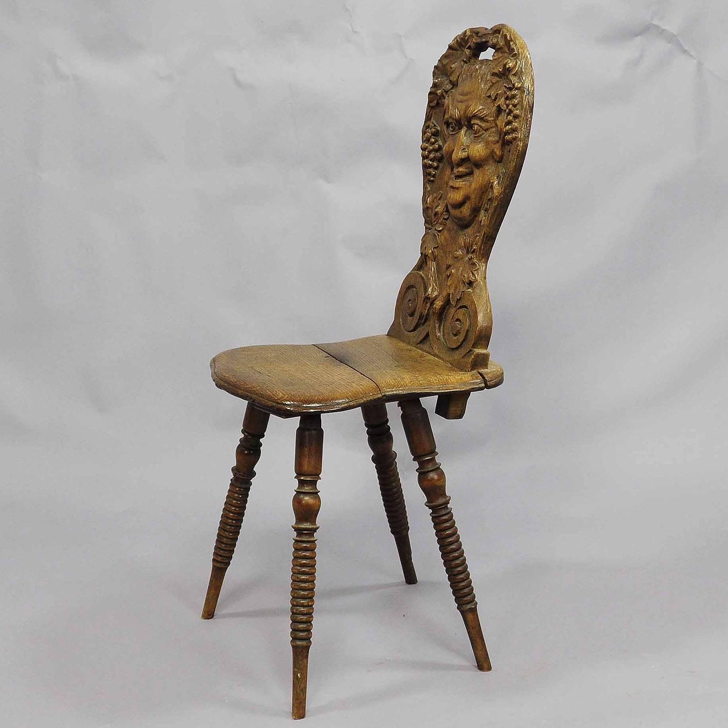 Black Forest Carved Wedding Board Chair with Bacchus, circa 1900