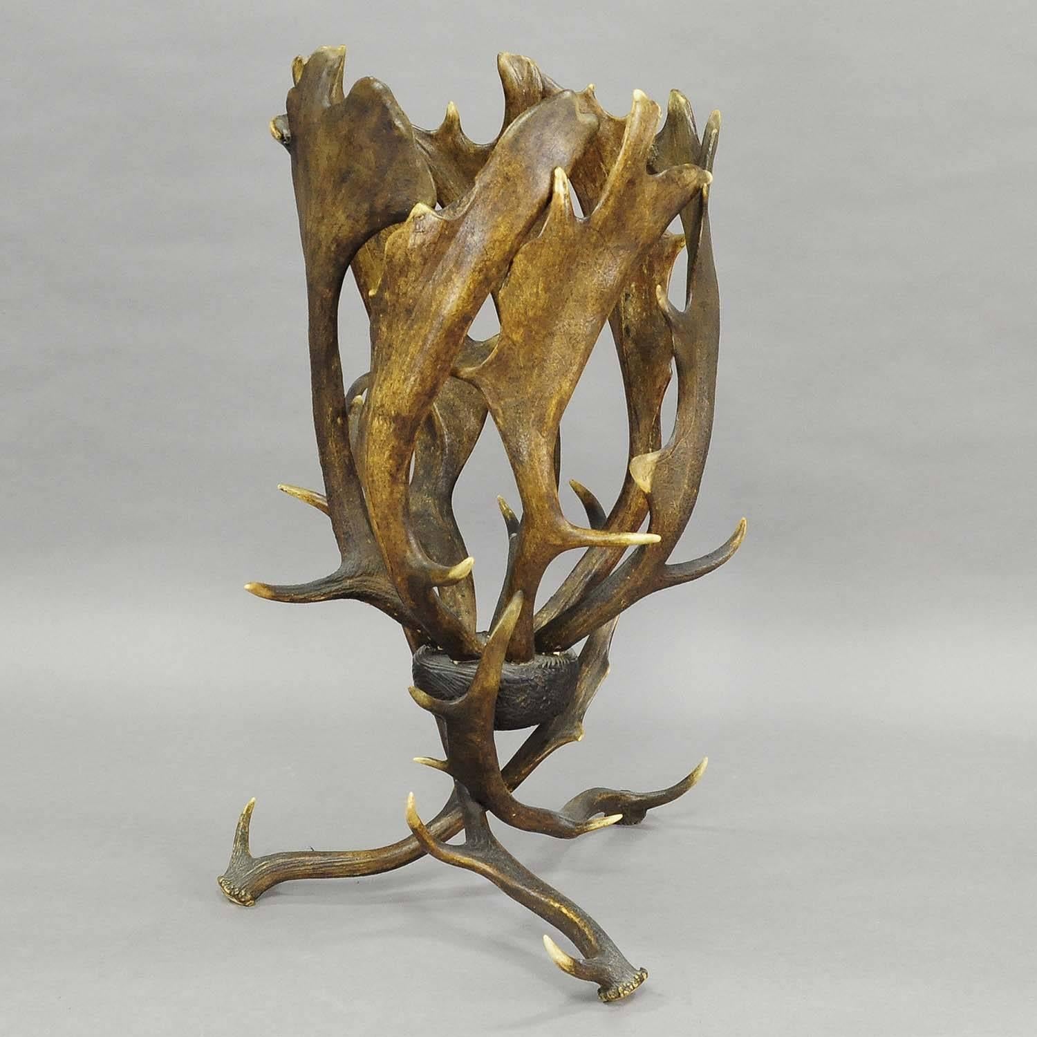 A rustic cabin decor antler basket made of real fallow deer and deer antlers, Germany, manufactured circa 1900.