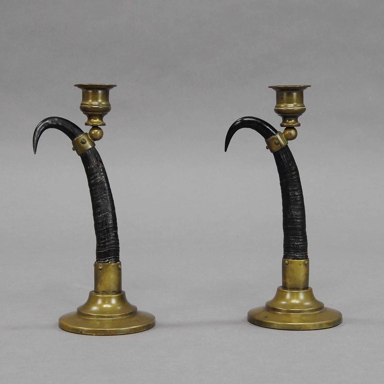 Two antique candleholders made of real chamois horns. Base and spouts made of brass, Germany, circa 1880.