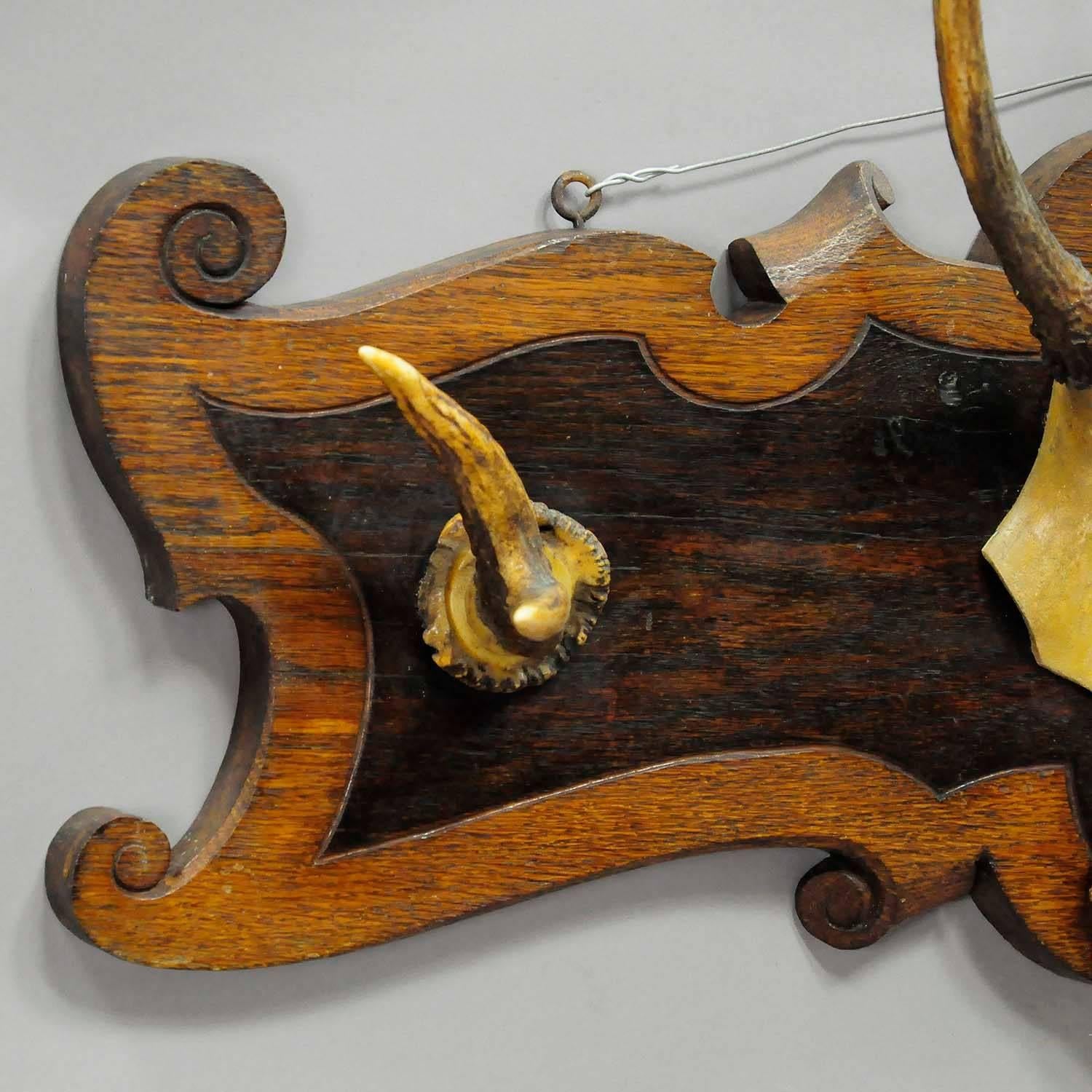 Rustic Antique Wooden Wardrobe with Deer Antlers
