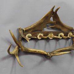 Antique Rustic Wardrobe with Deer Antlers