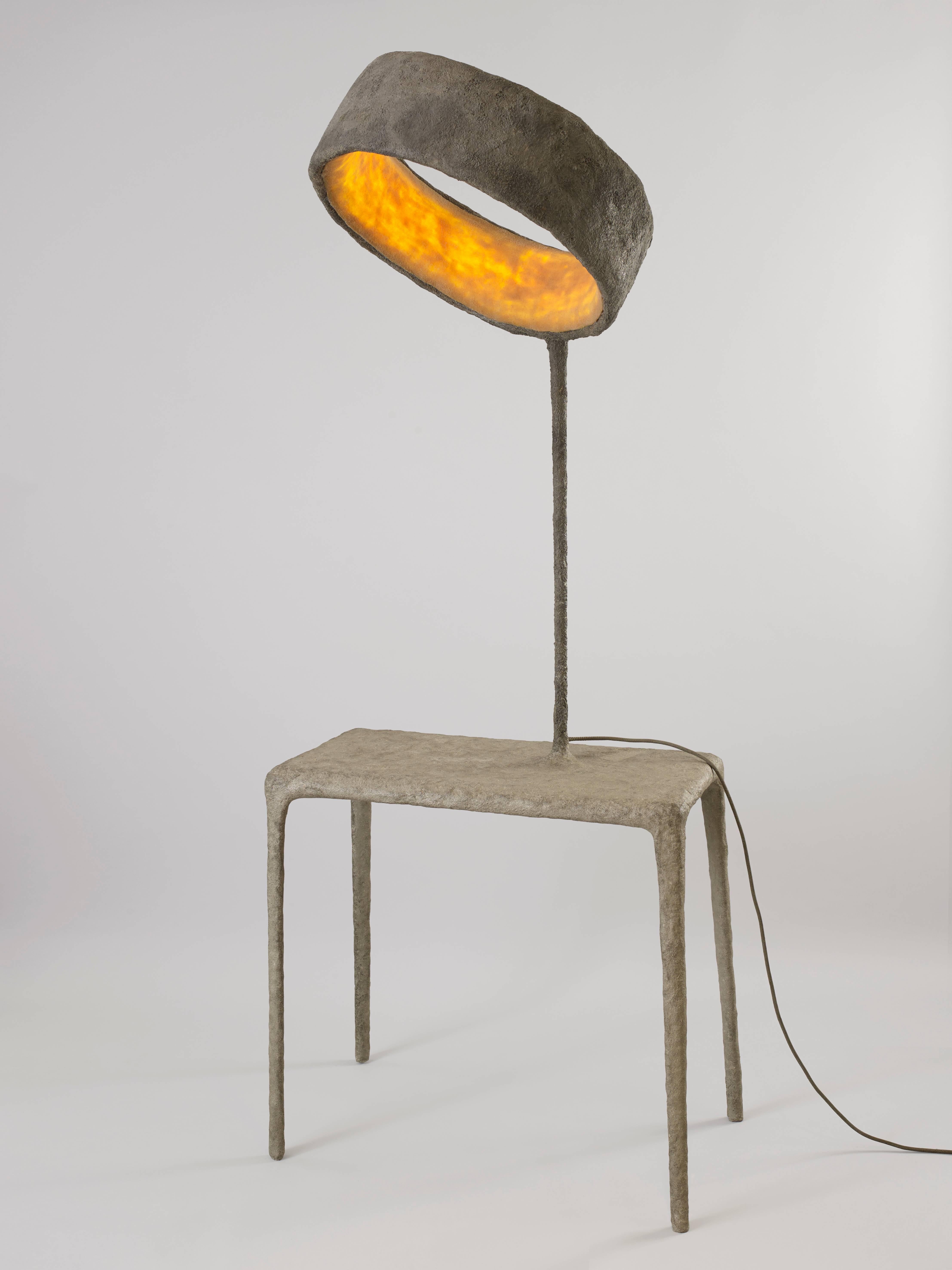 Orange and brown ‘Luciferase’ is a hybrid handmade sculptural console and light-producing creature. It is part of ‘Luciferase’, a collection at the boundaries of Art and Design and Nacho Carbonell’s first work incorporating light. 

“The root of