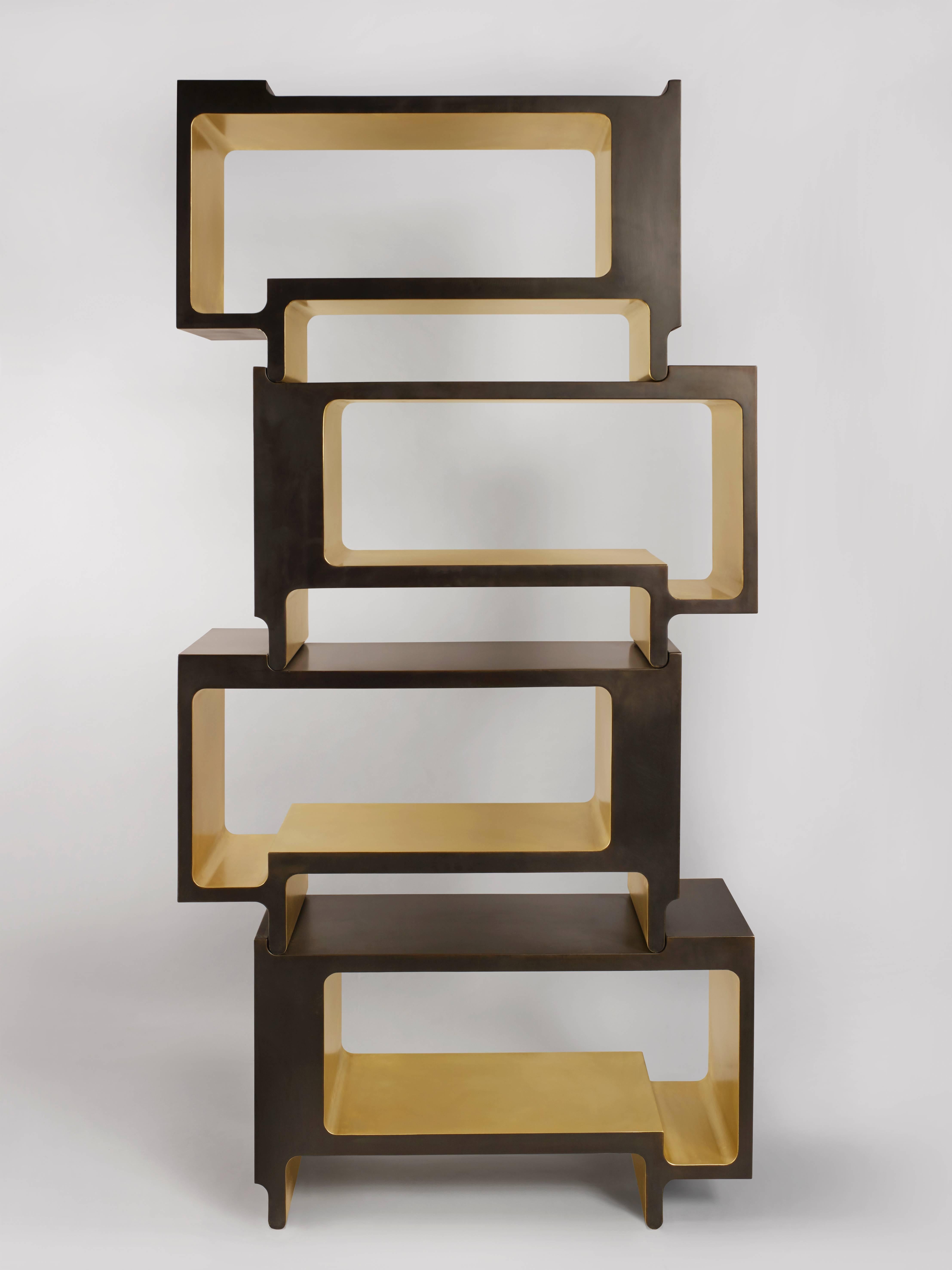 ‘XiangSheng II Shelving Unit‘ is an elegant collectible design work that combines champagne colored brushed bronze surfaces, and oxidized bronze with an intense brown patina. This limited edition bookcase includes four individual units. Units can be