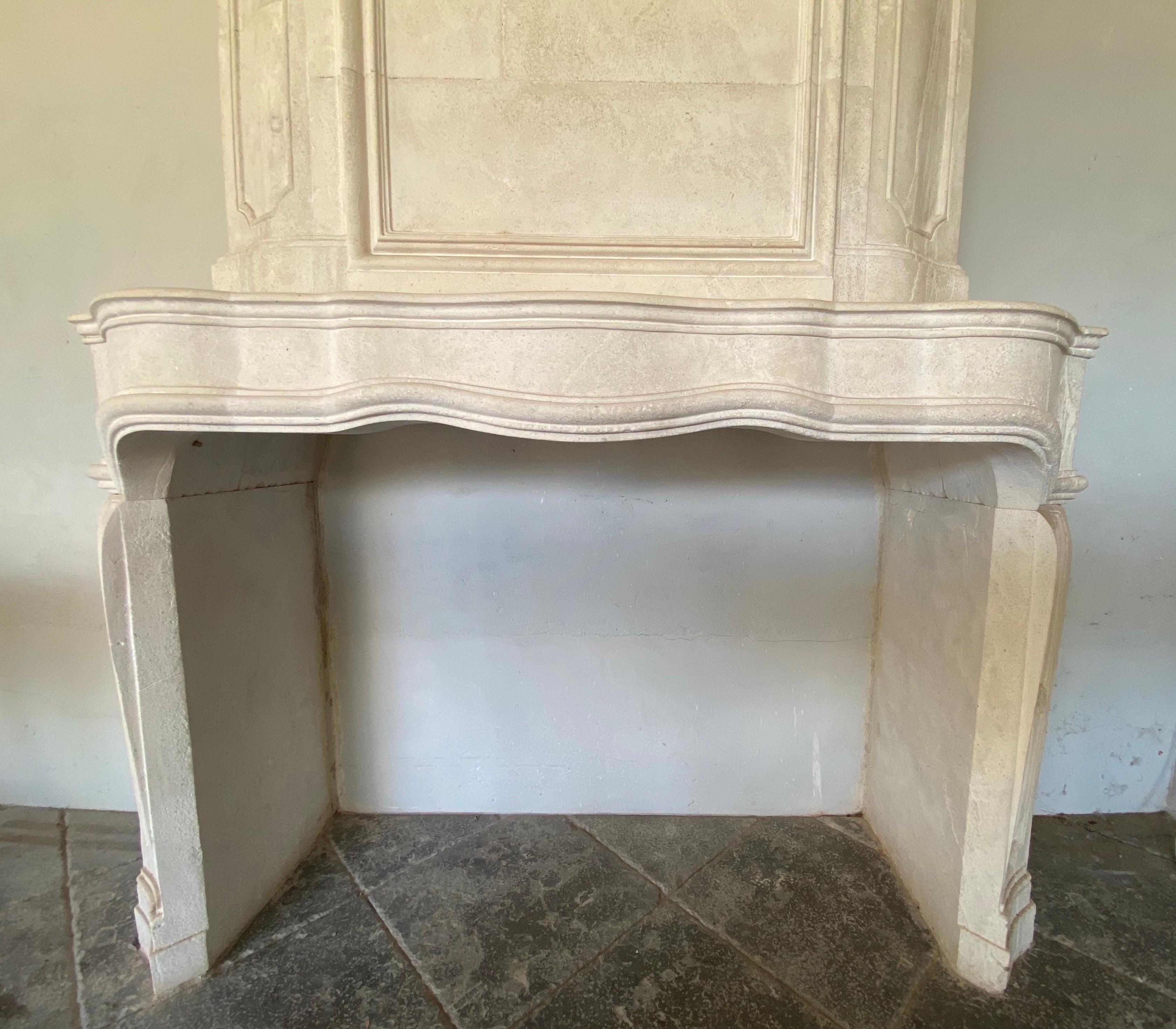Late 20th century Re-edition Louis XIV style fireplace aged limestone For Sale 7