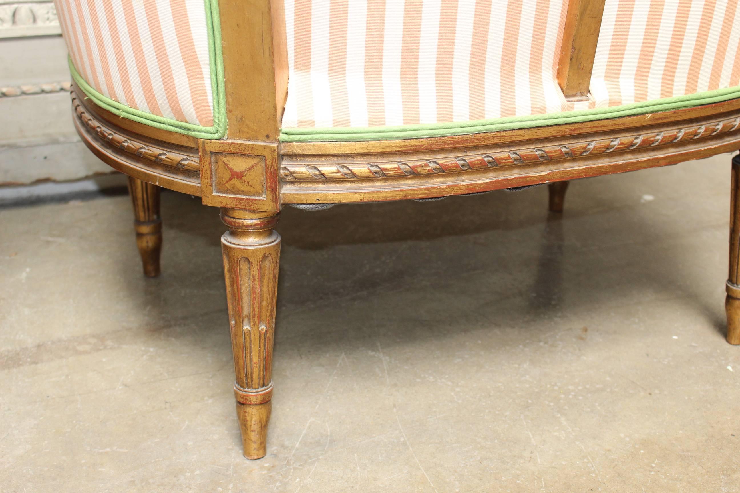 Wood Pair of 19th Century French Louis XVI Style Armchairs with a Gold Leaf Finish For Sale
