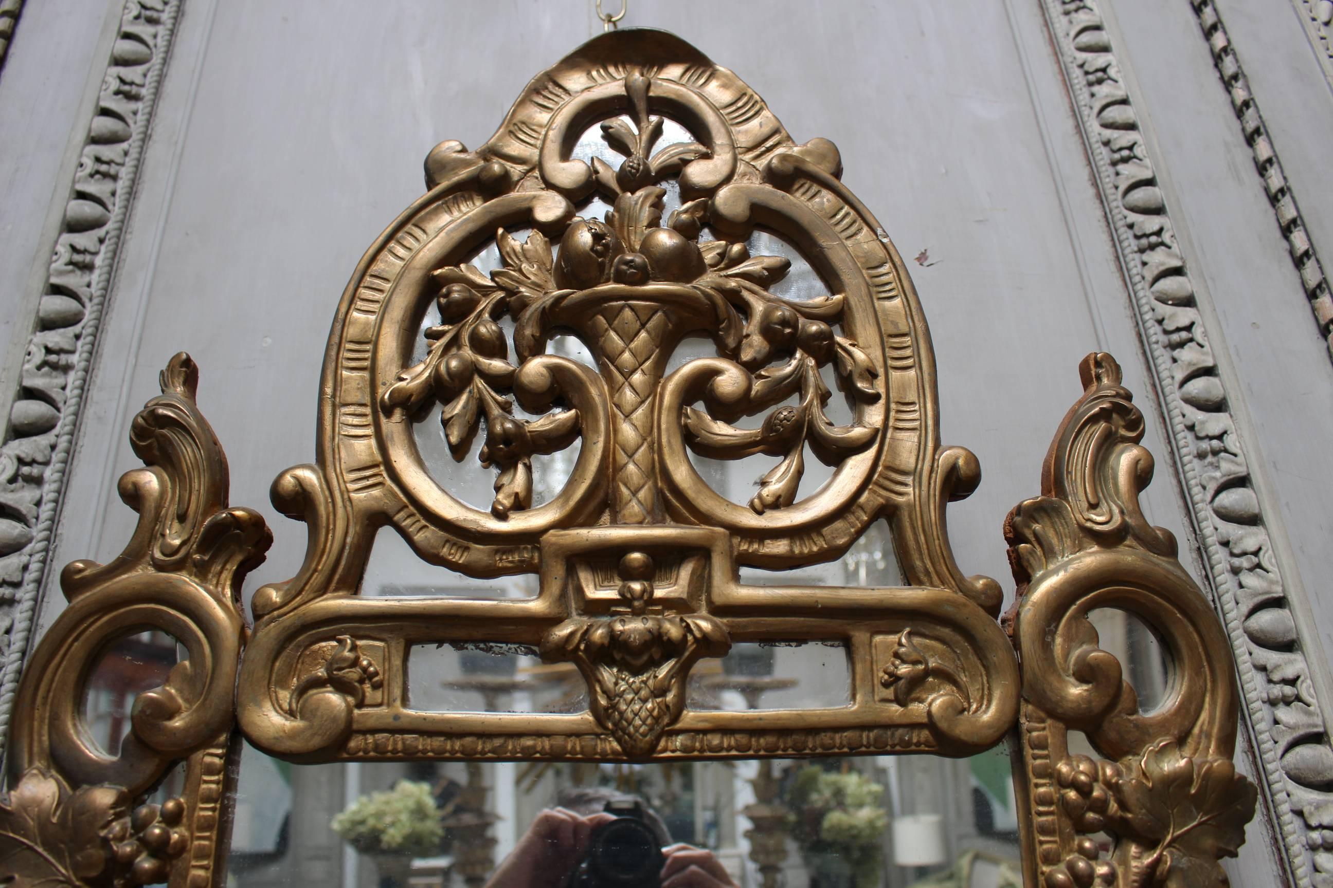 Régence 18th Century French Regence Mirror with a Gold Leaf Finish For Sale