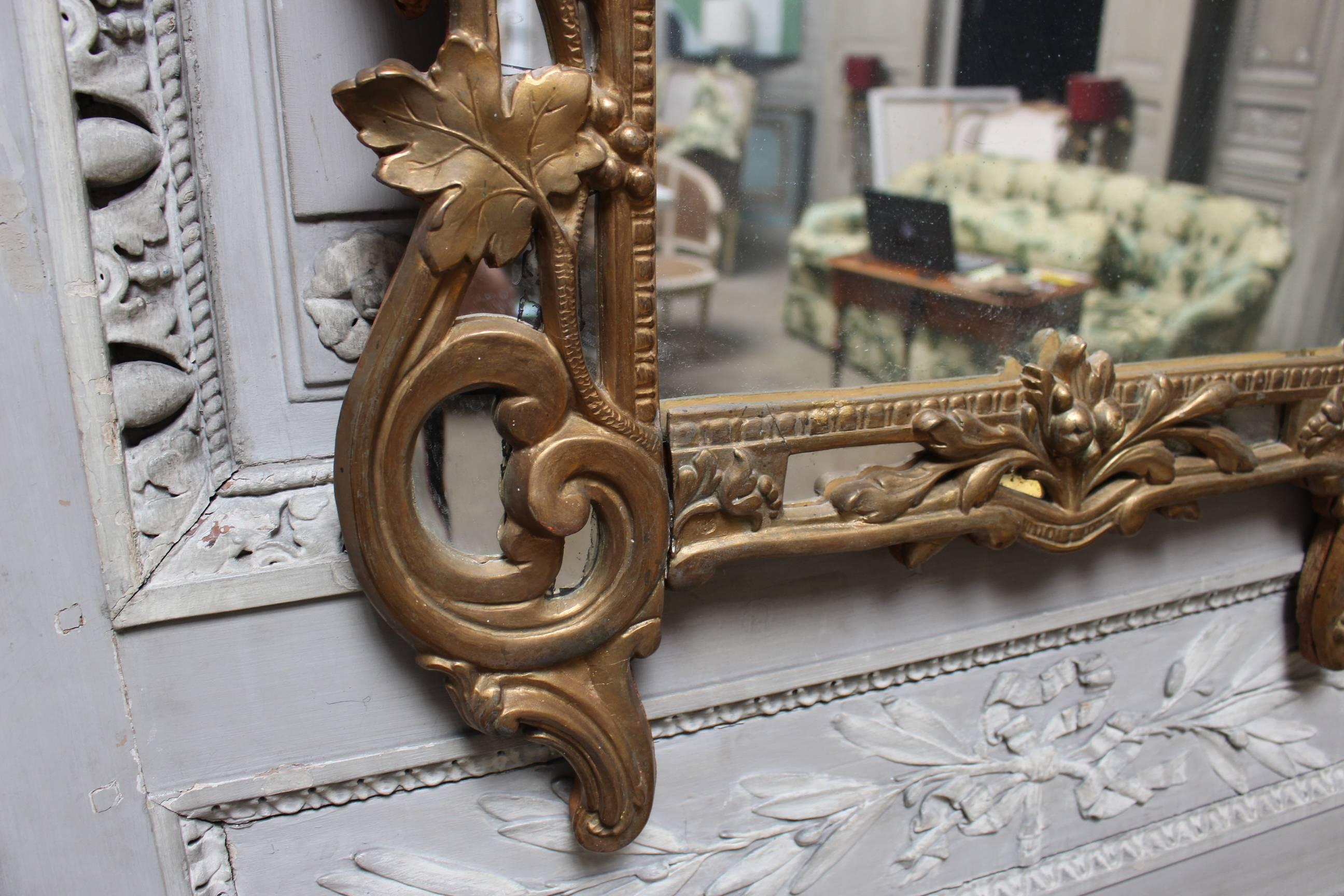 Molded 18th Century French Regence Mirror with a Gold Leaf Finish For Sale