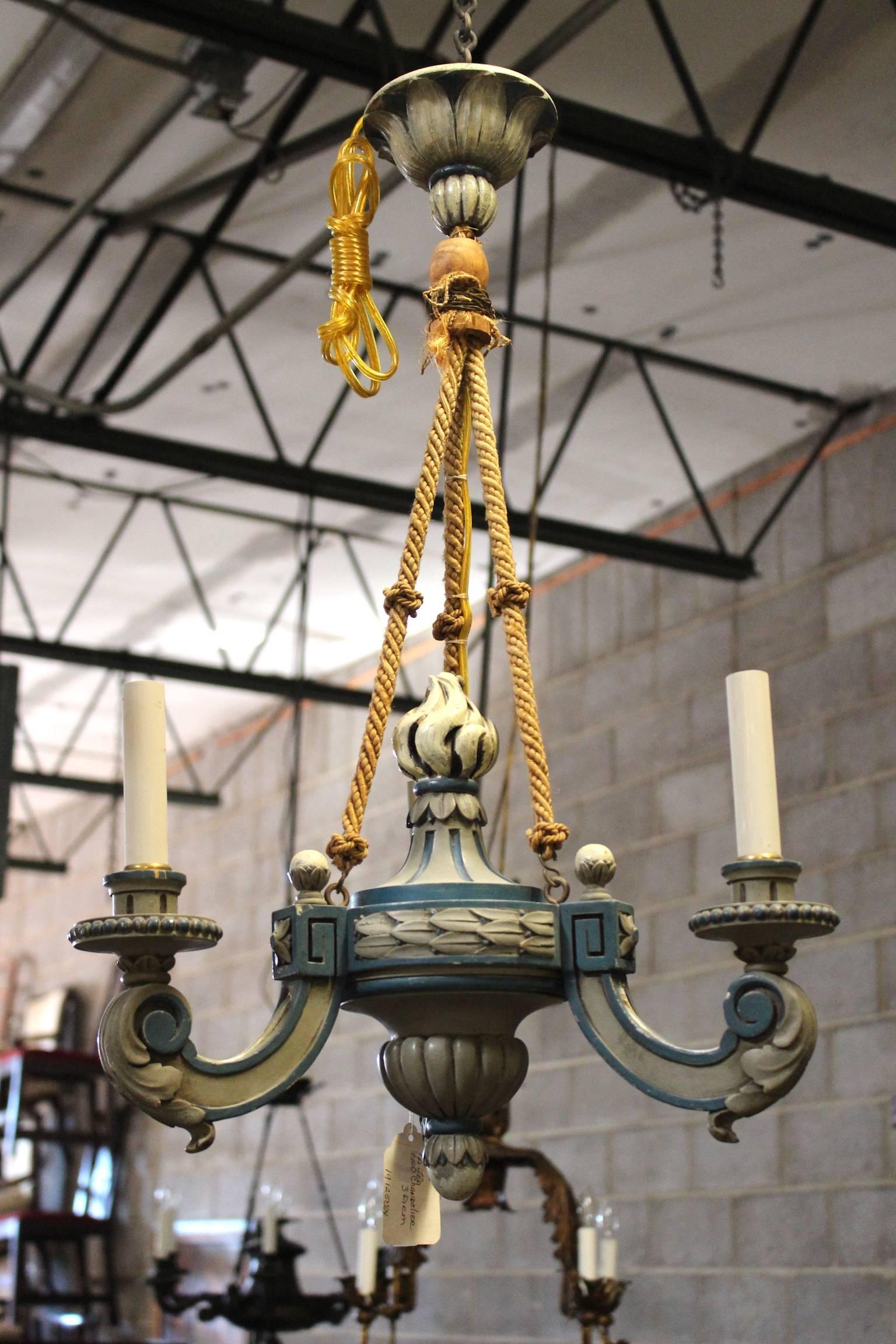 A French Louis XVI style painted wood and braided rope chandelier.