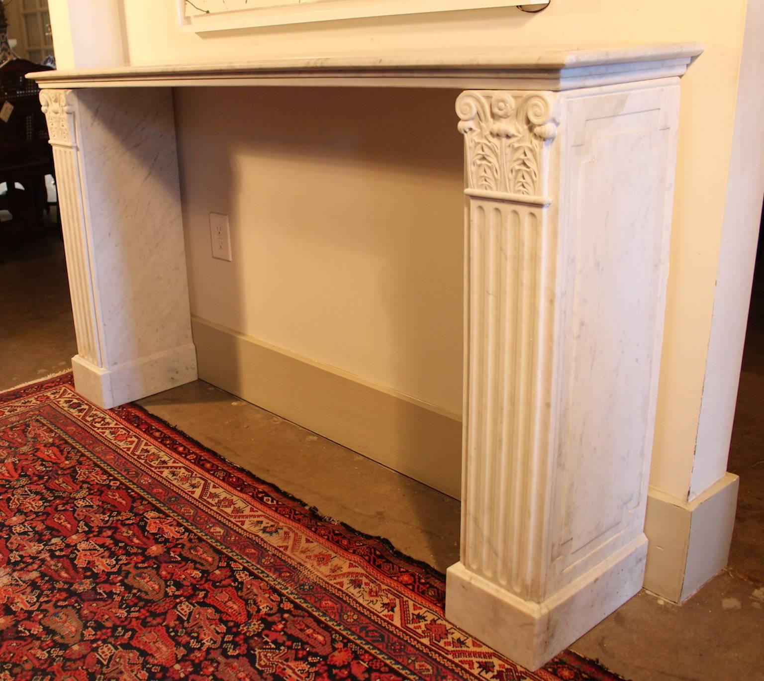 A French neoclassical style white marble console.