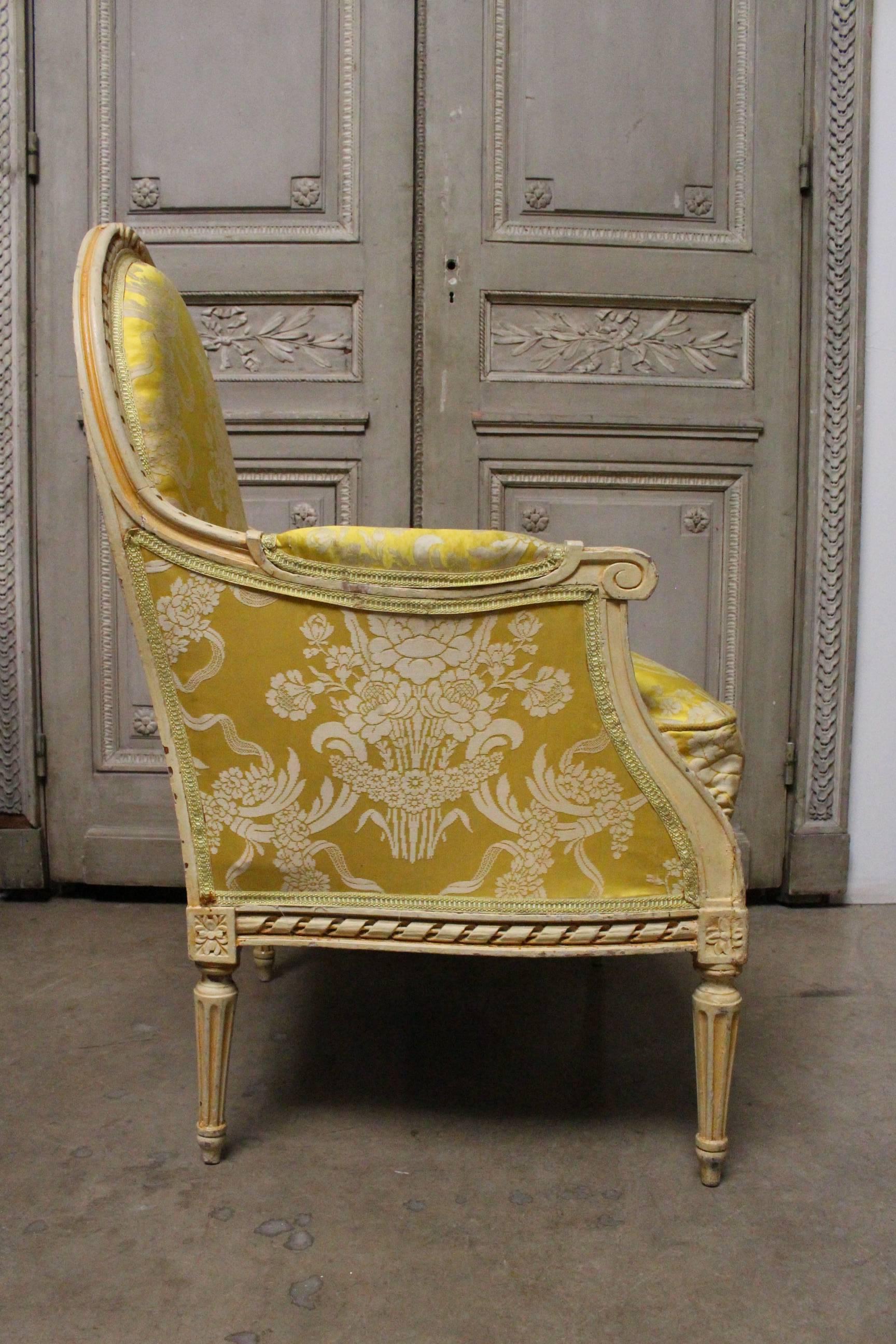 A very large pair of French Louis XVI style begeres with a painted finish.