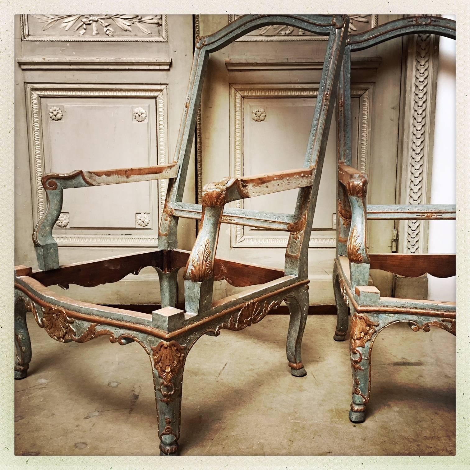 Régence Pair of French Baroque Style Armchair Frames in a Blue and Gilt Finish For Sale