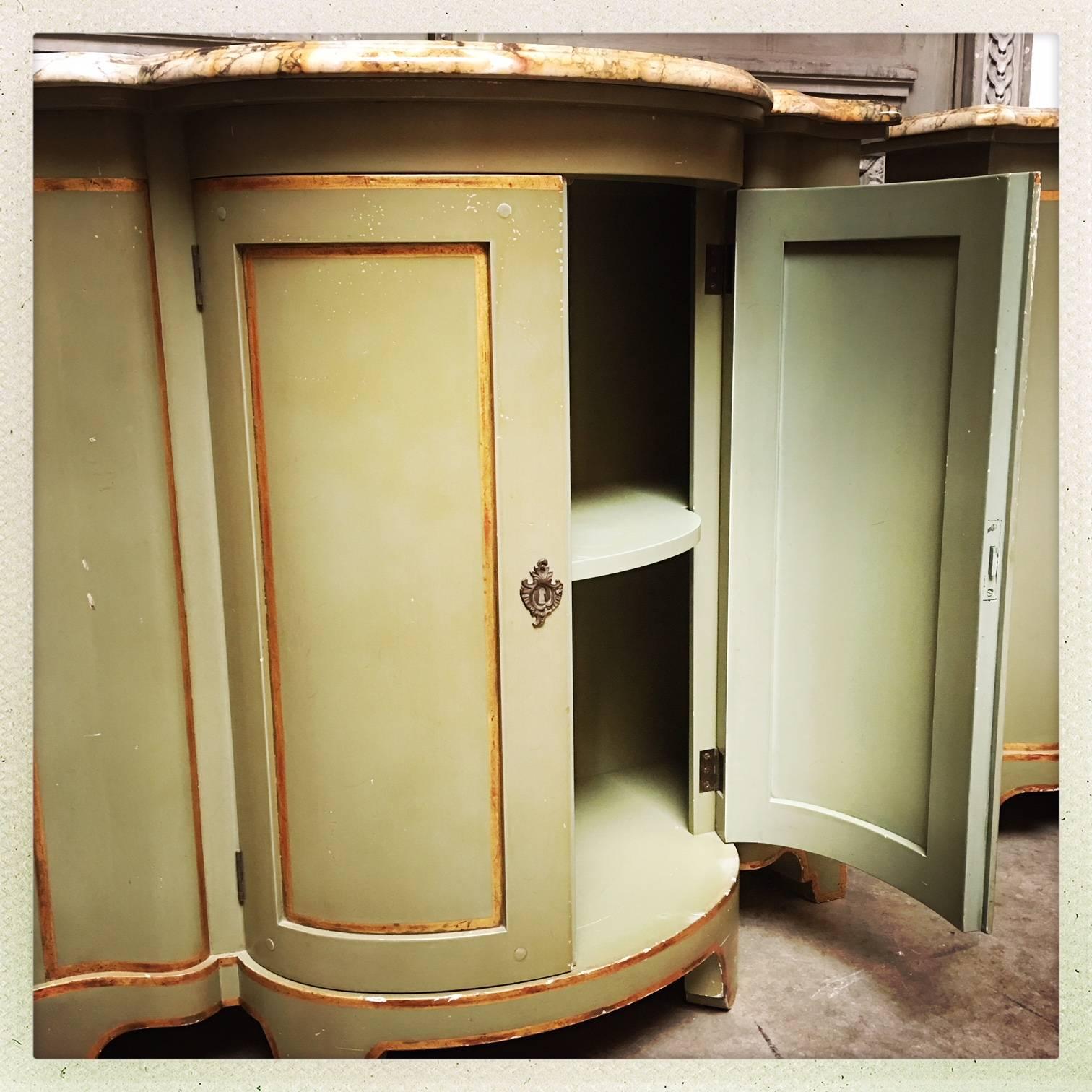 A Pair of Painted And Parcel Gilt Cabinets With Marble Tops 1