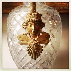 A Pair of French Louis XVI Style Bronze Mounted Cut Crystal Urns