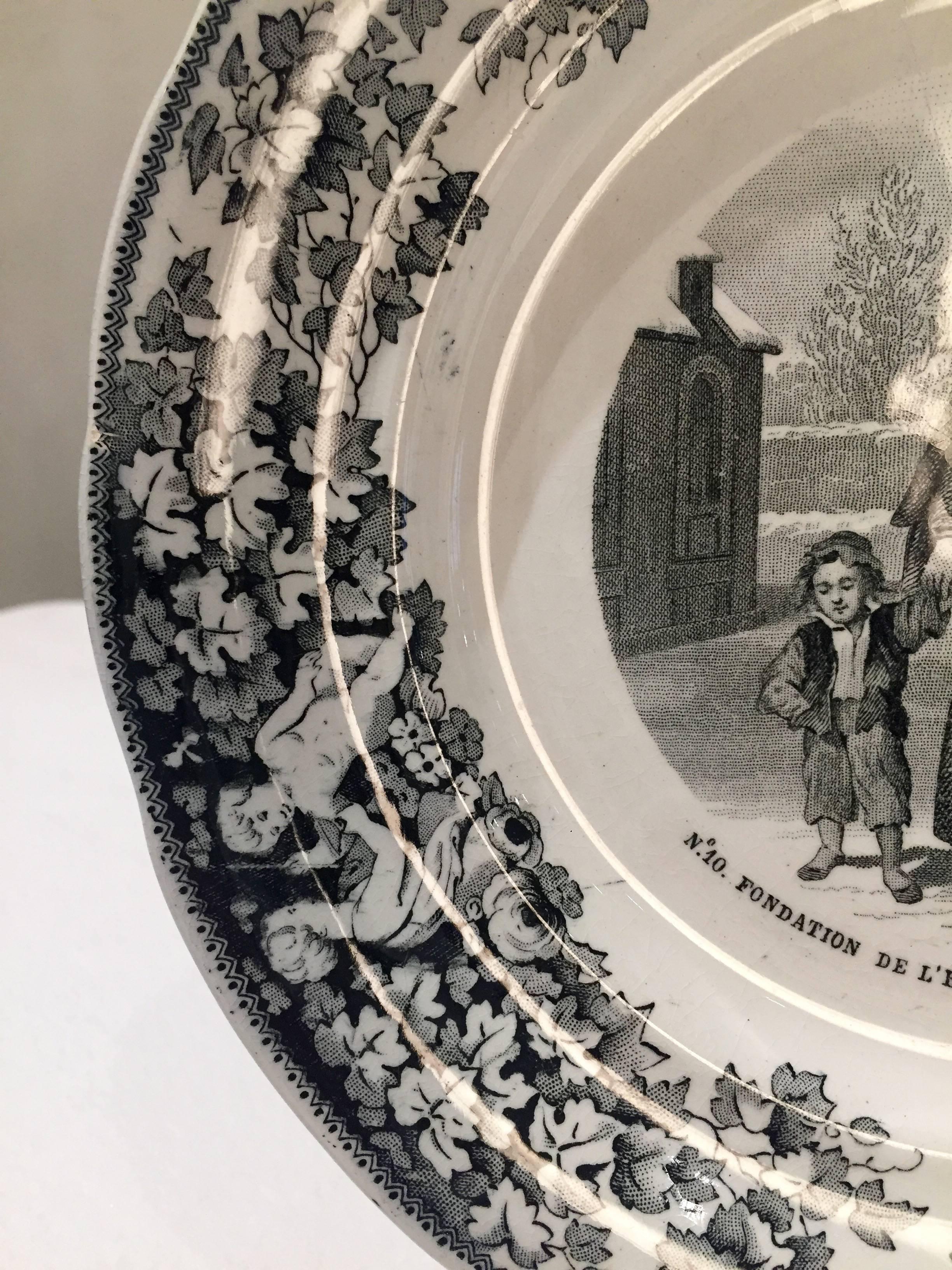These two Faience shelf plates depict a country parish priest attending
to a wounded soldier and on plate two, rescuing two children. The plates were
issued in 1867 by the french firm Creil & Montereau using the trademark 
L.M.& Cie ( Lebeuf et