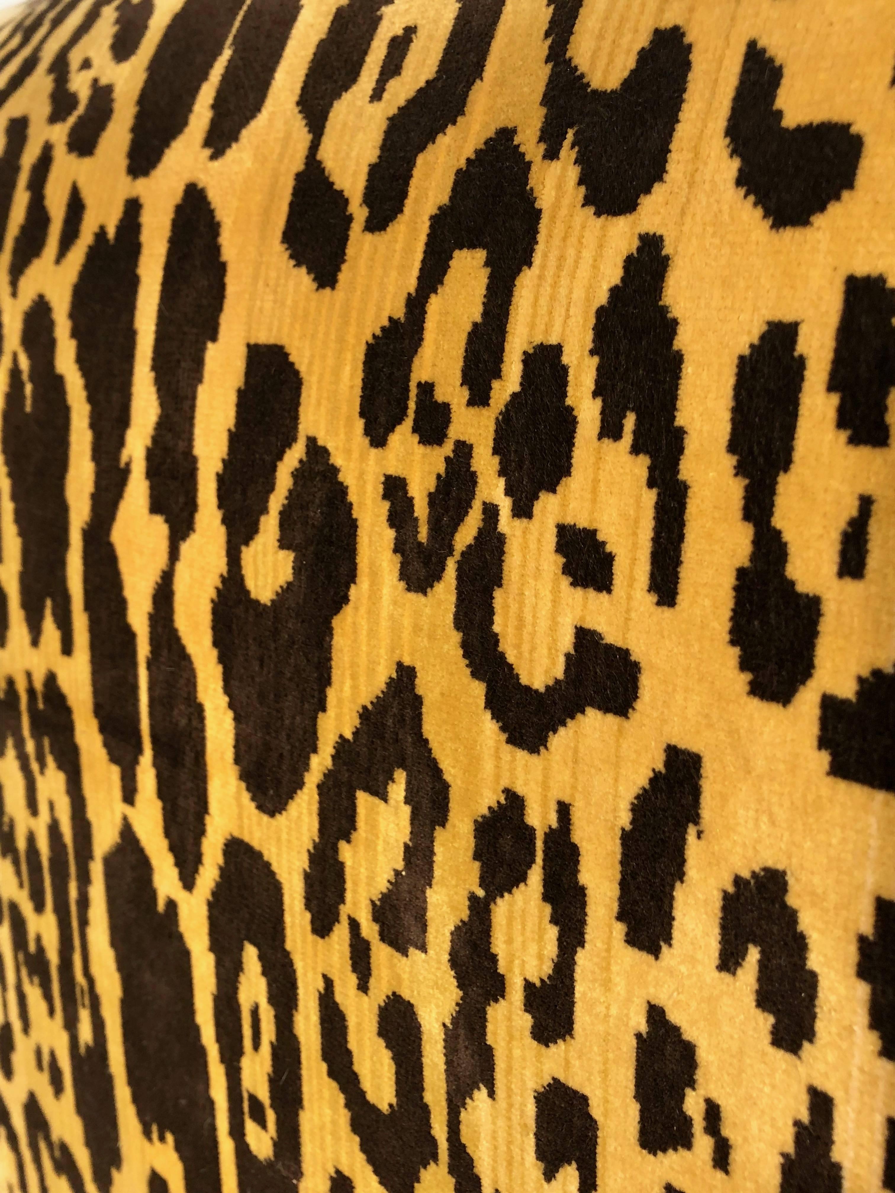 A wonderfully upholstered queen size headboard -
high end leopard velvet fabric.