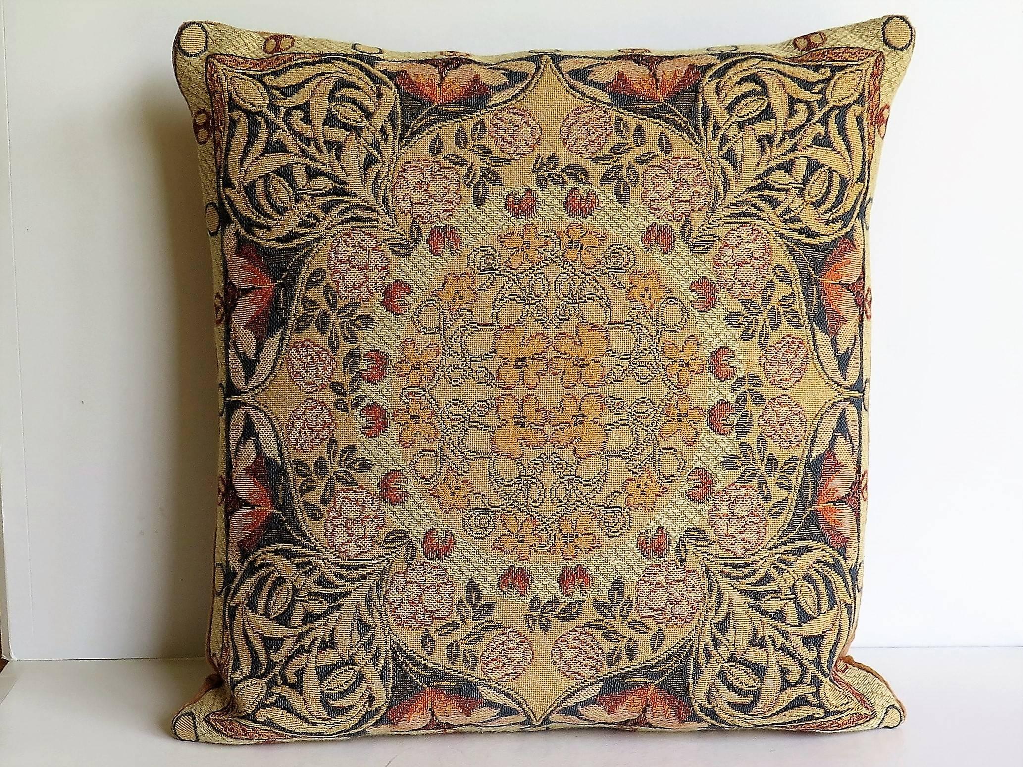 This is a very attractive woven tapestry pillow or cushion which we date to the mid-20th century, probably of French origin.

The classical themed design was probably inspired by earlier Flemish designs and has an Art Nouveau style, depicting a