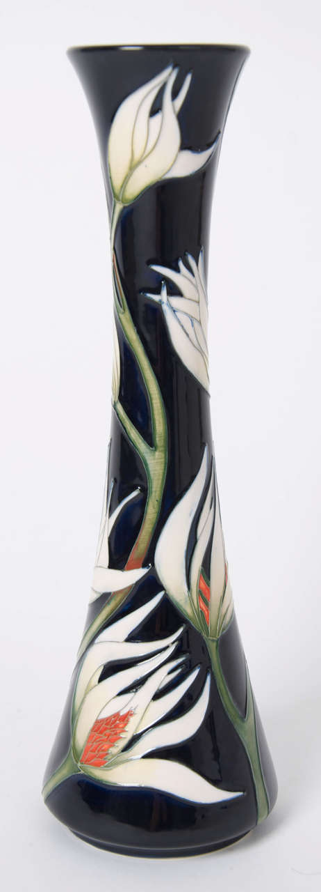 This superb and elegant vase by the Moorcroft factory was designed by Samantha (Sam) Johnson in 2004. Sam Johnson was a designer for Moorcroft for seven years and her work is avidly collected.

The vase is beautifully decorated in a winding white