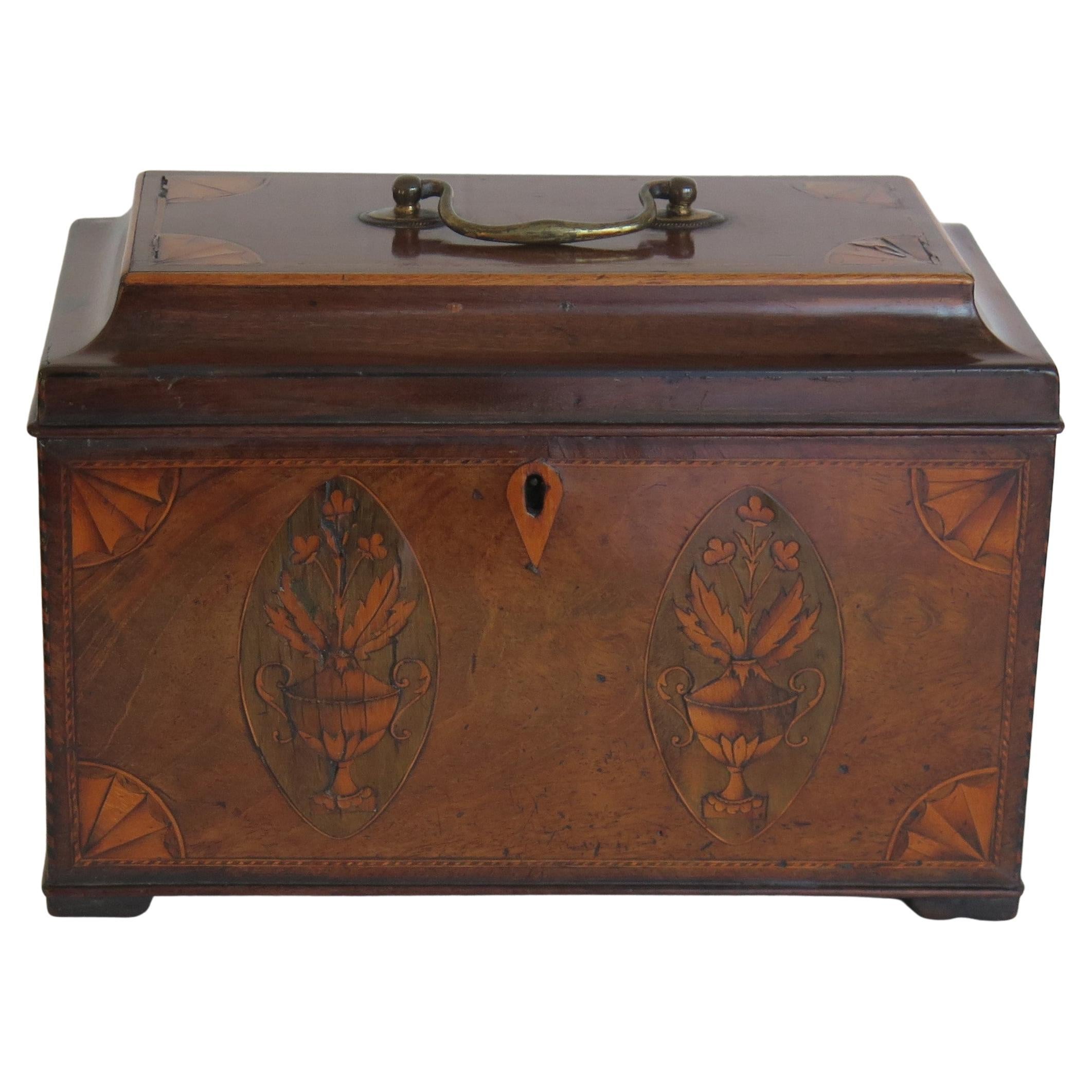 A very beautiful, fine quality, inlaid Tea Caddy from the English Georgian, Sheraton Period, Circa 1780.

The Tea Caddy is all handmade with very fine quality features;
* Beautifully chosen figured hardwoods.
* Exceptional inlays of Shells, Fan
