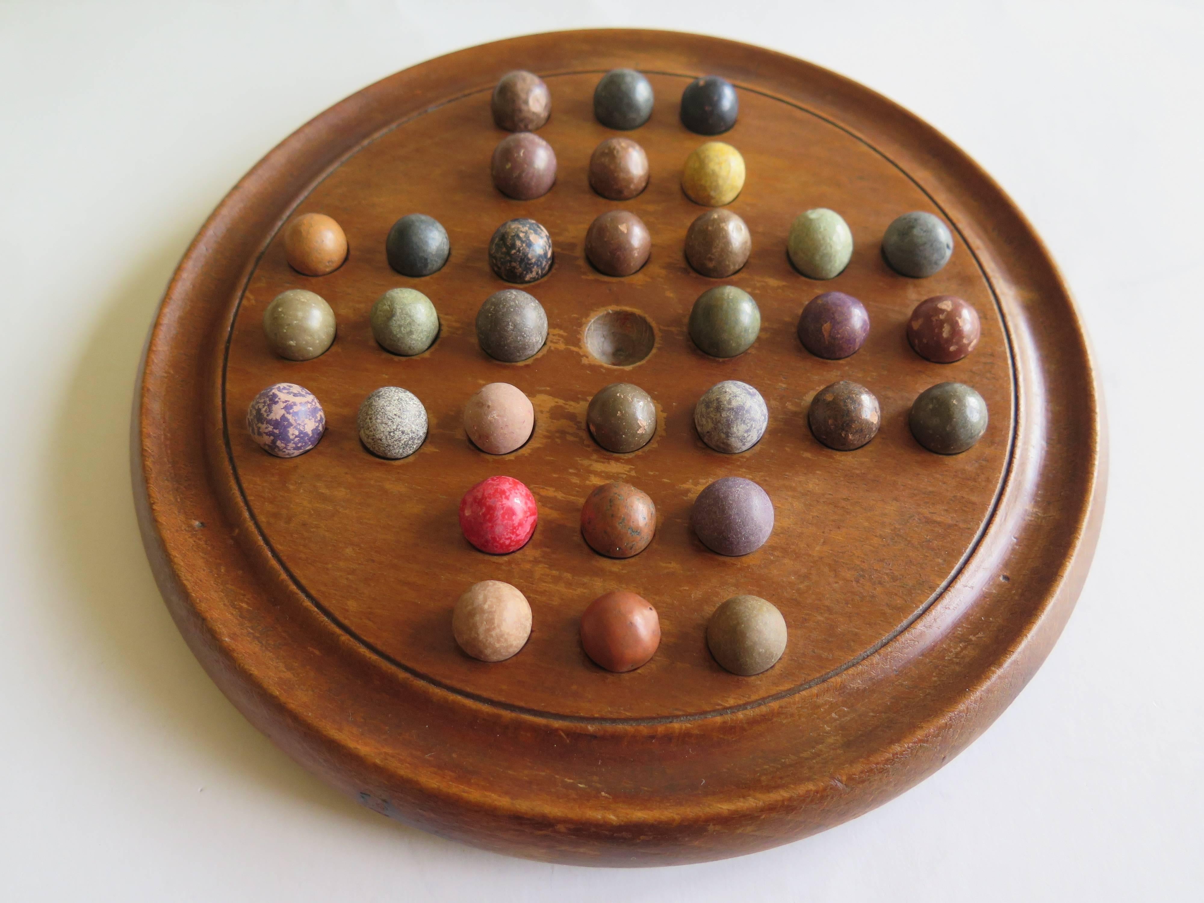 wooden board games with marbles