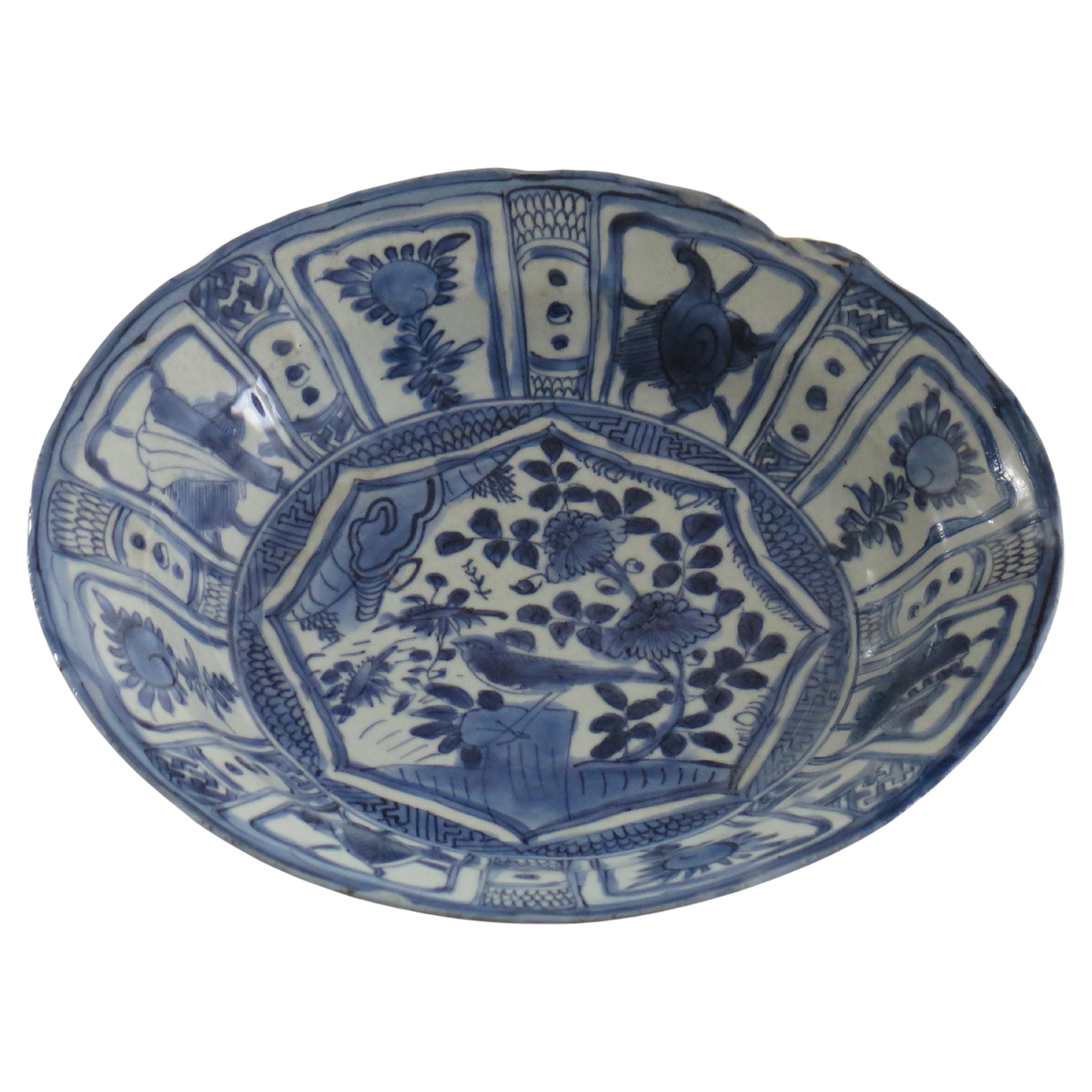 This is a Kraak or Kraak-ware Chinese Export porcelain dish or deep plate hand painted in a typical Blue and white pattern, made during the reign of Wanli (1573 to 1620).

The dish is potted with a slightly everted rim with a well cut foot rim.