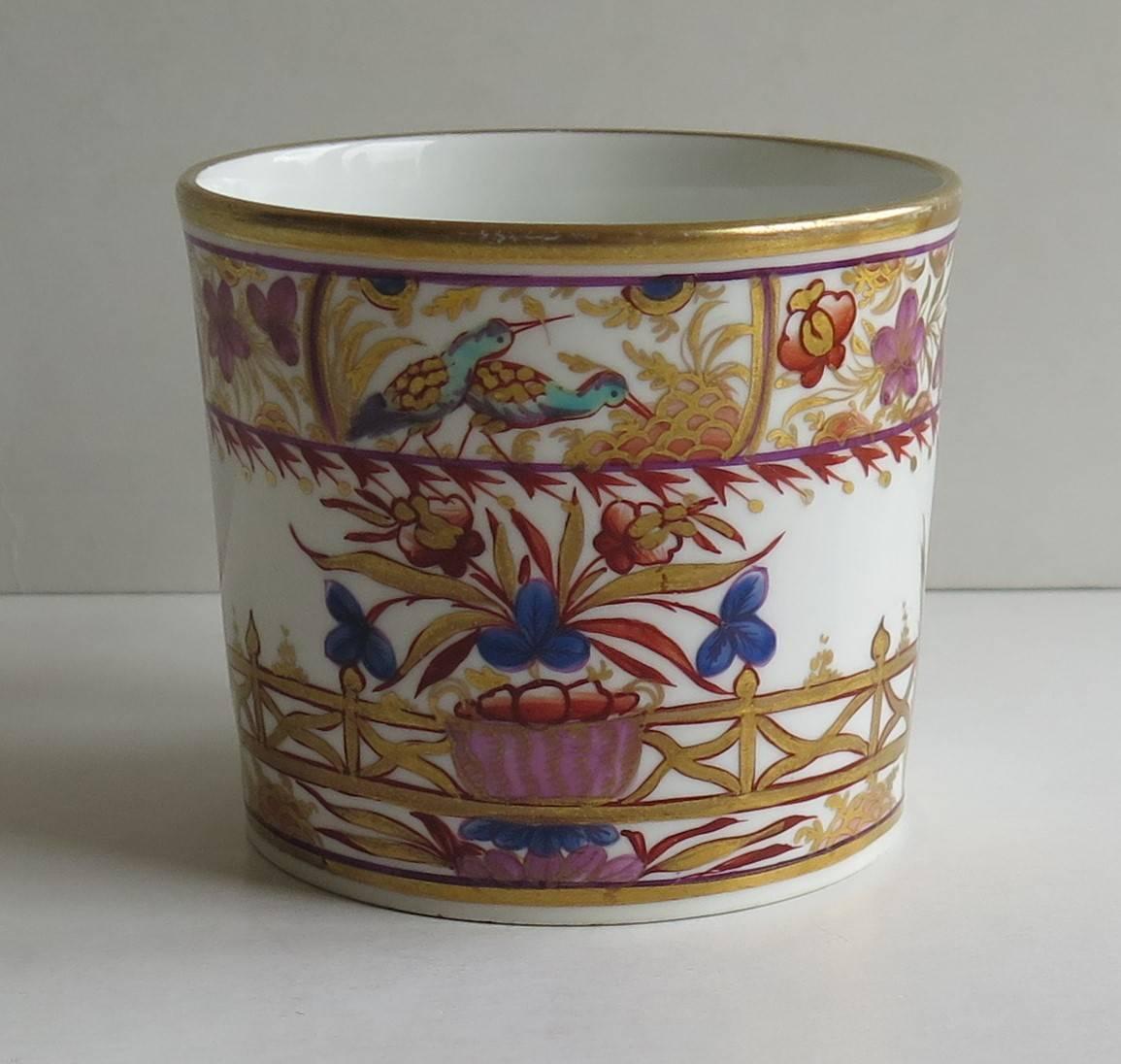 This is a high quality Coffee Can that we attribute to the Coalport Porcelain works, Shropshire, England, made during the John Rose period of the late Georgian years, circa 1810.

The coffee can is nominally parallel, tapering slightly to the base,