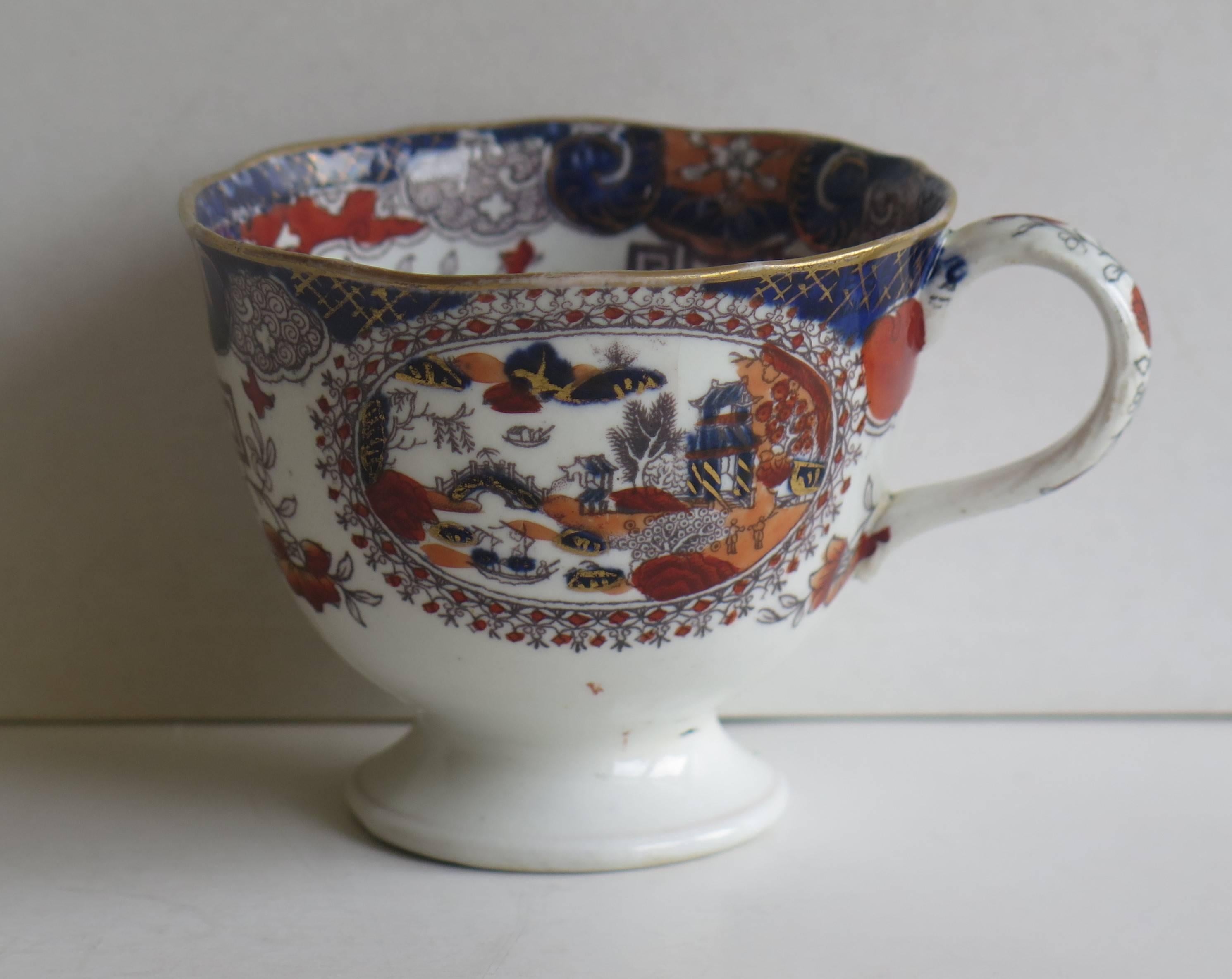 This is a footed ironstone China coffee cup made by Mason's of Lane Delph, Staffordshire, England, during the early part of the 19th century.

Individual coffee cups like this are hard to find.

The pattern is number 303, called 