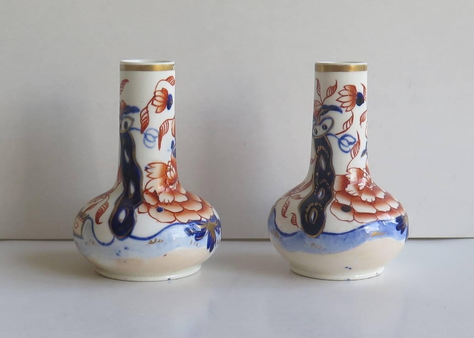 These are a beautiful pair of scent or perfume bottles made in porcelain by Mason's ( C J Mason) of Lane Delph, Staffordshire Potteries, England.

They are decorated in the Fence Japan pattern which is a well known Mason's pattern as shown on page