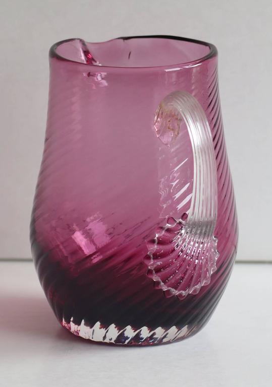 Two Victorian Cranberry Glass Milk or Cream Jugs Wrythen Moulded, circa ...