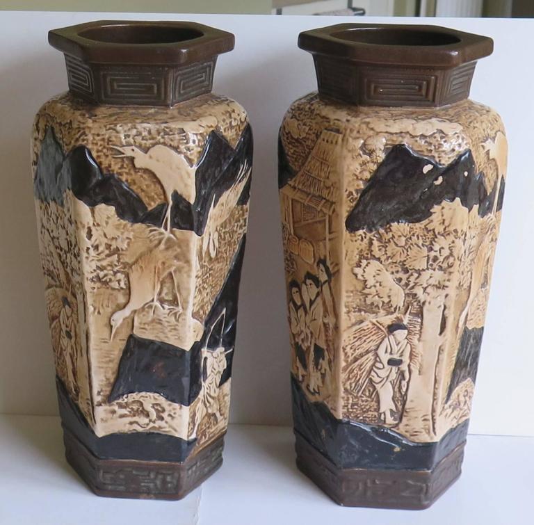 Pair of Large Pottery Vases by Bretby with Oriental Scenes, English
