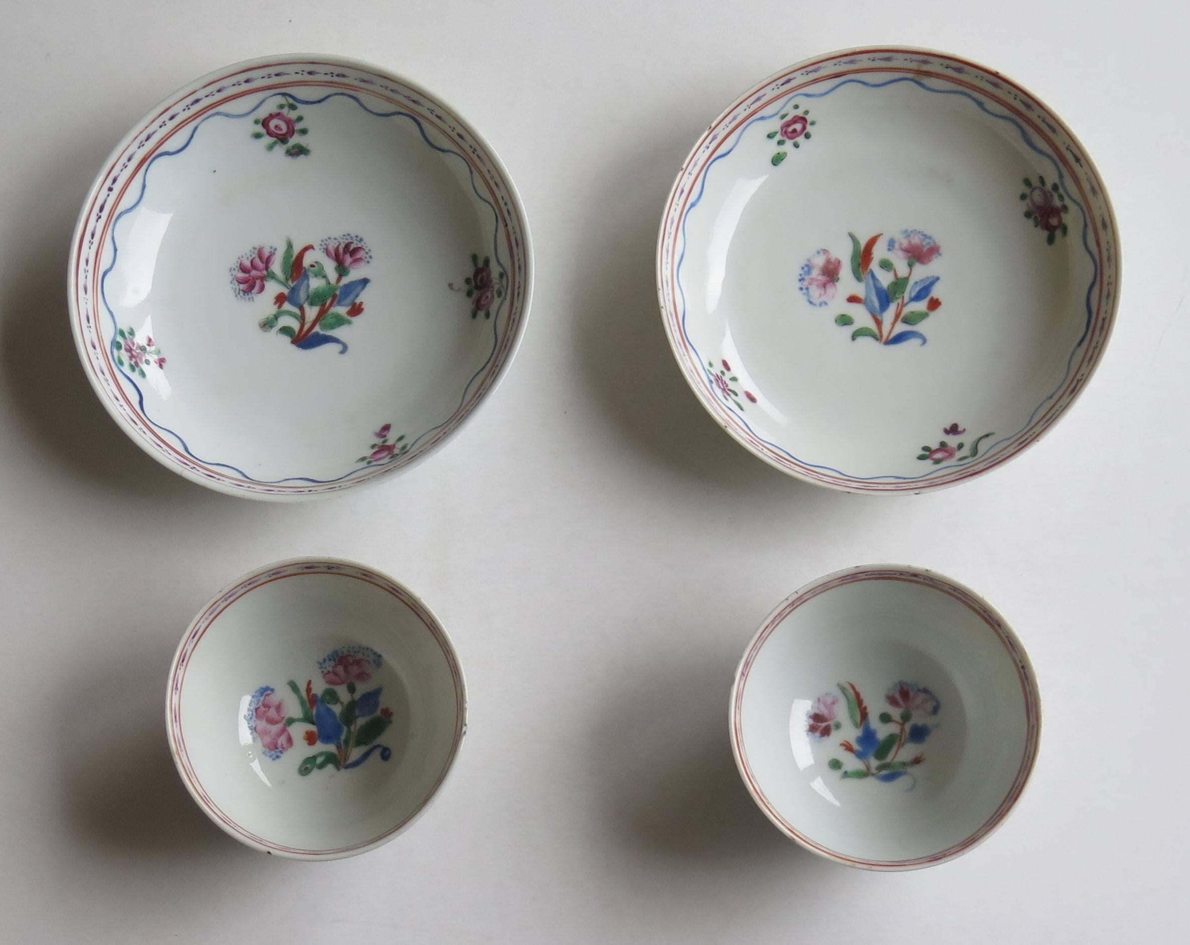 These are a fine matching pair of Chinese porcelain tea bowls and saucers, hand painted in the Famille-Rose palette and dating to the Qing, Quianlong period of the 18th Century, Circa 1780.

There are four pieces altogether, two tea bowls with two