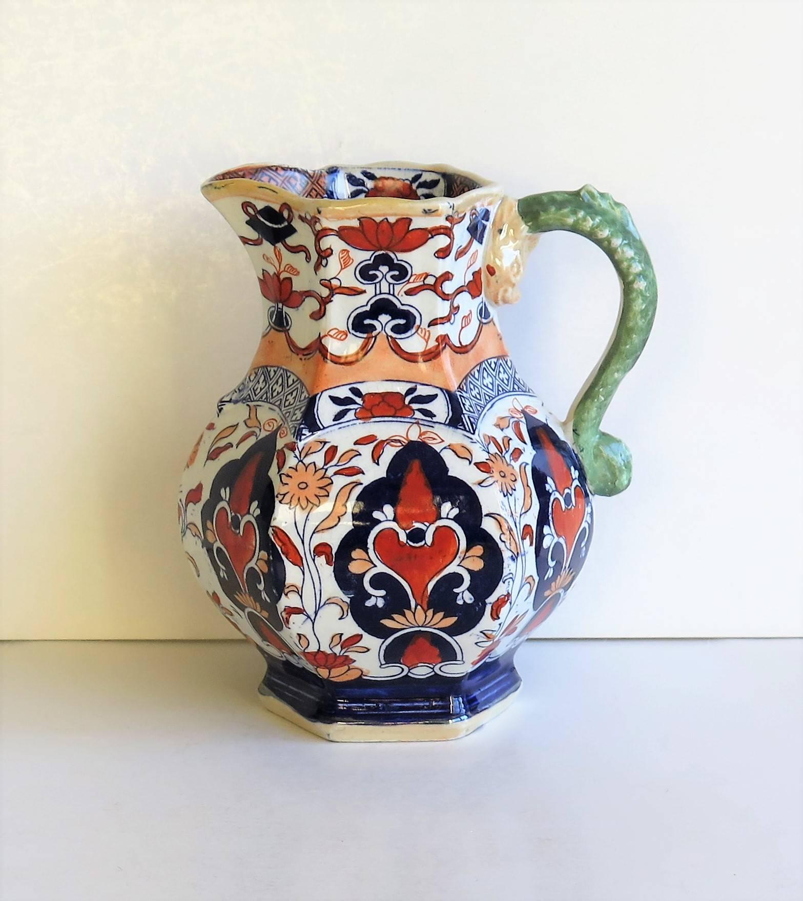 This is an unusual jug or pitcher made by Mason's ironstone pottery.

It has a rare shape and pattern.

A jug of the same shape and pattern is illustrated on Page 192, Plate 245 of Godden's guide to Mason's China and the ironstone wares,