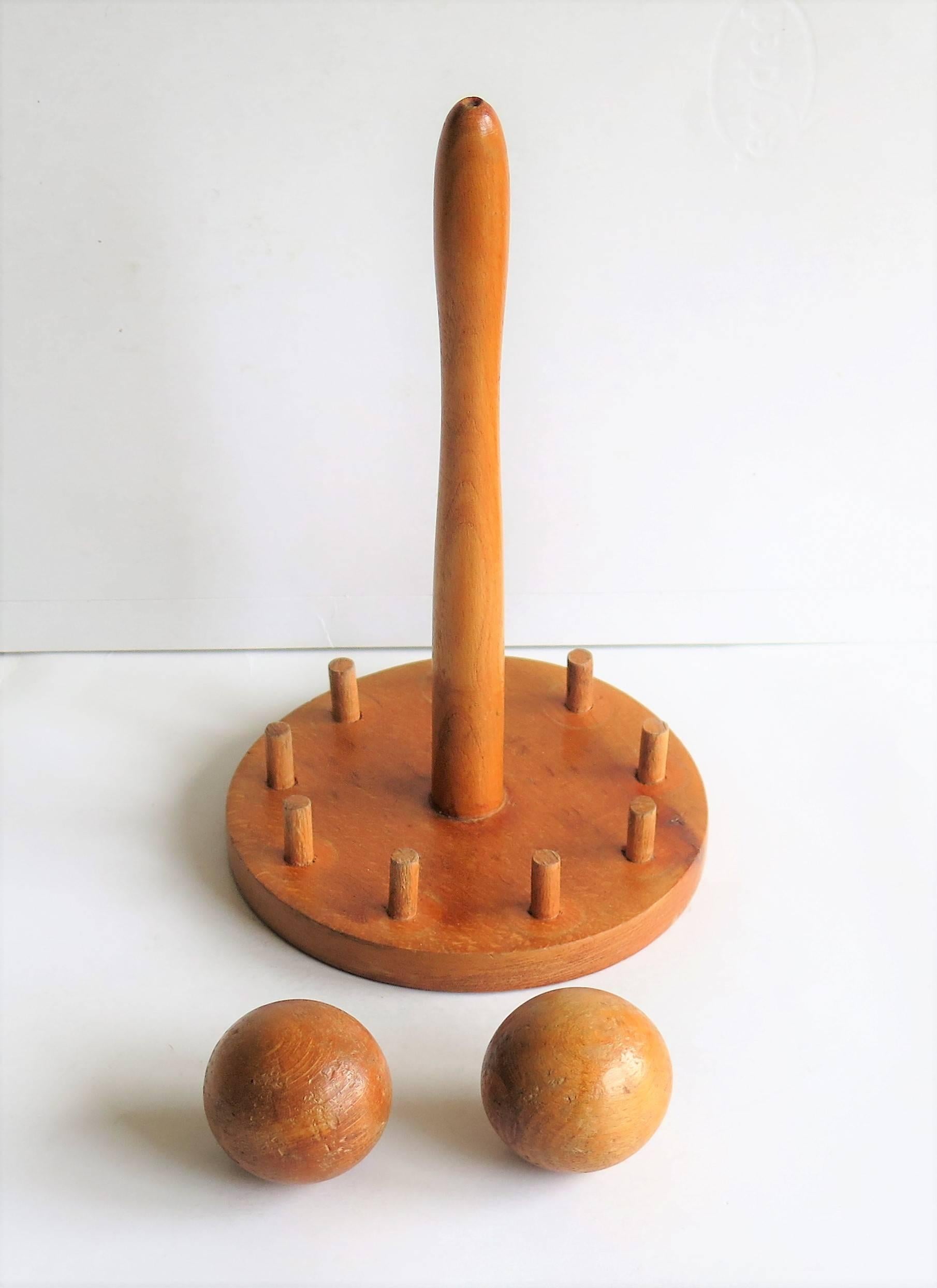 English Indoor Carpet Skittles Game, Nine-Pin, Two Balls and Stand, circa 1930s