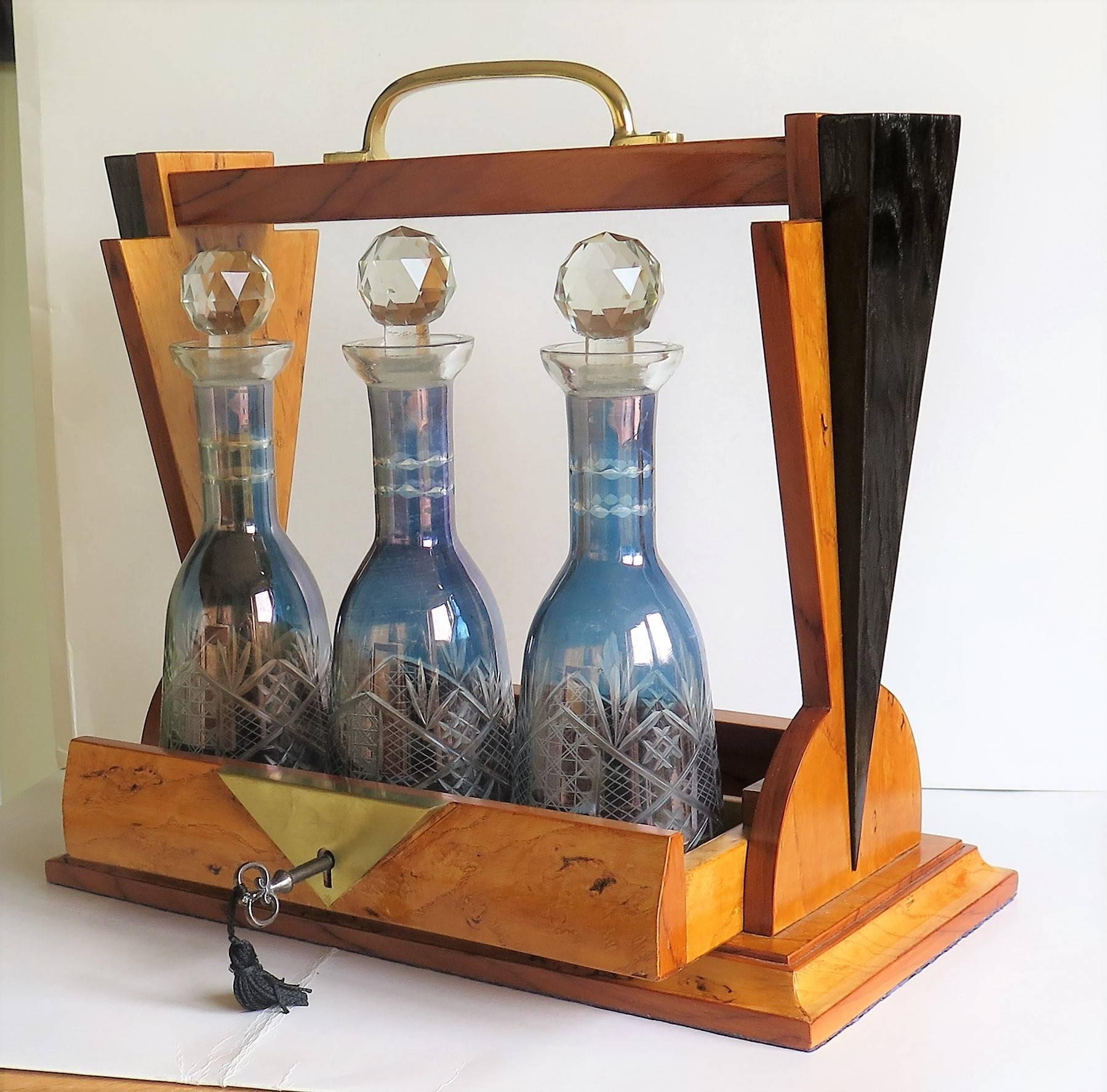 Art Deco Tantalus with Three Blue Cut Glass Engraved Decanters lockable, French  In Good Condition For Sale In Lincoln, Lincolnshire