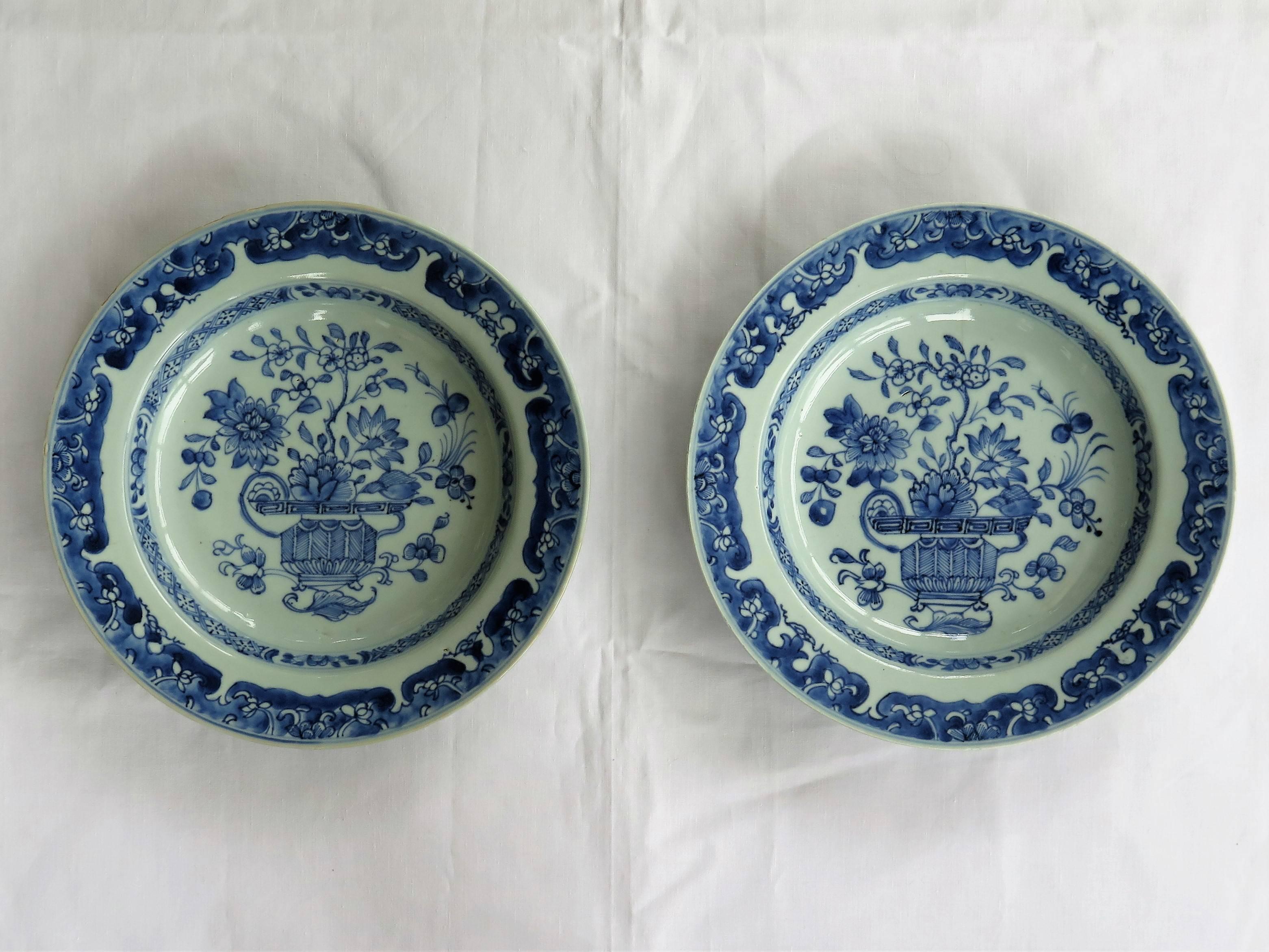 This is a very good pair of Chinese porcelain deep plates or bowls made for the export (Canton) market, during the second half of the 18th century, Qing-Qianlong period.

The plates are nicely hand potted with neatly trimmed foot rims. 

They