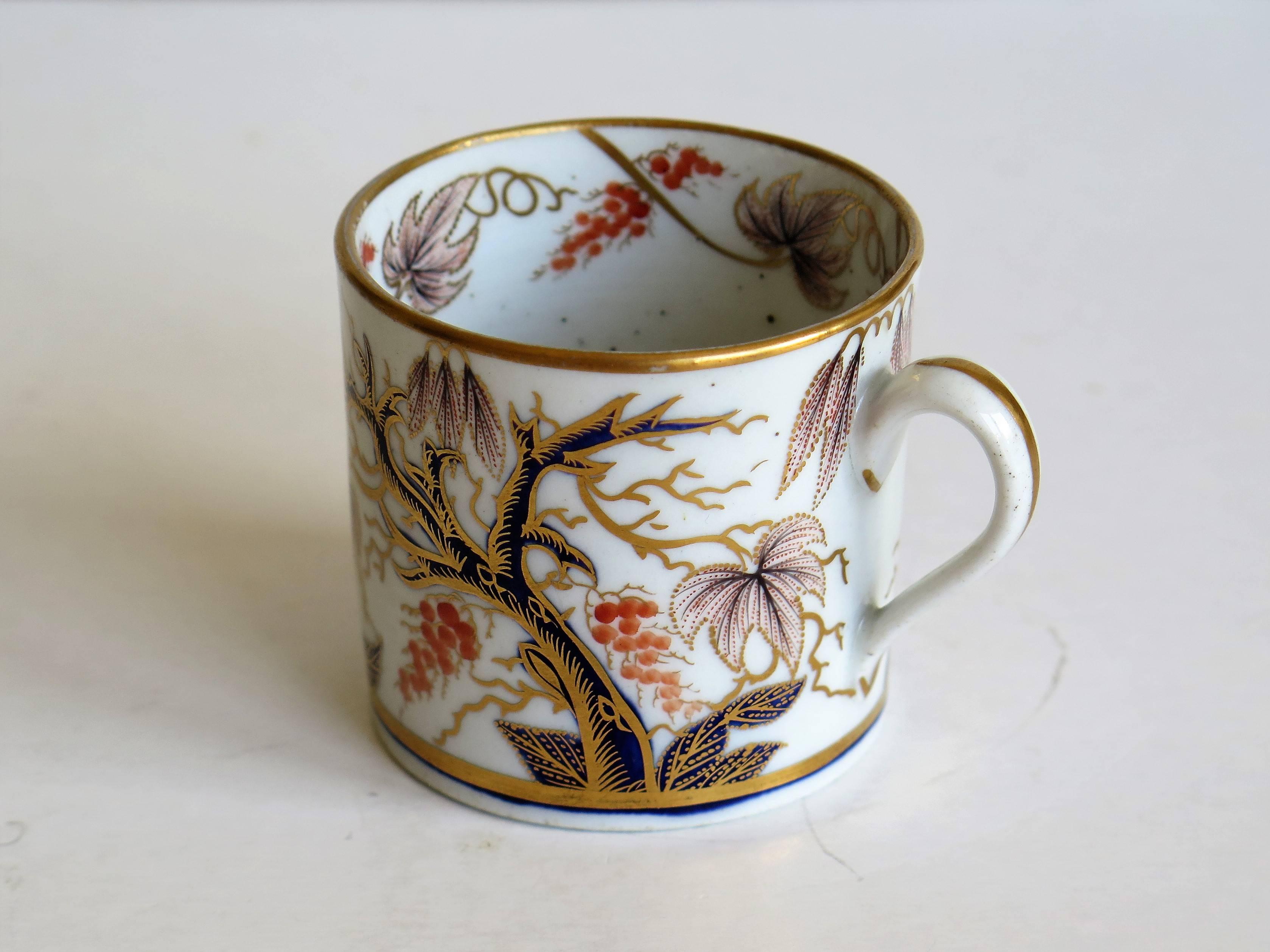 This is a beautifully hand-painted English coffee can, from the late George-III period, of the very early 19th century, circa 1805 which we attribute to New Hall.

This coffee can is nominally straight sided with a plain loop handle having fairly
