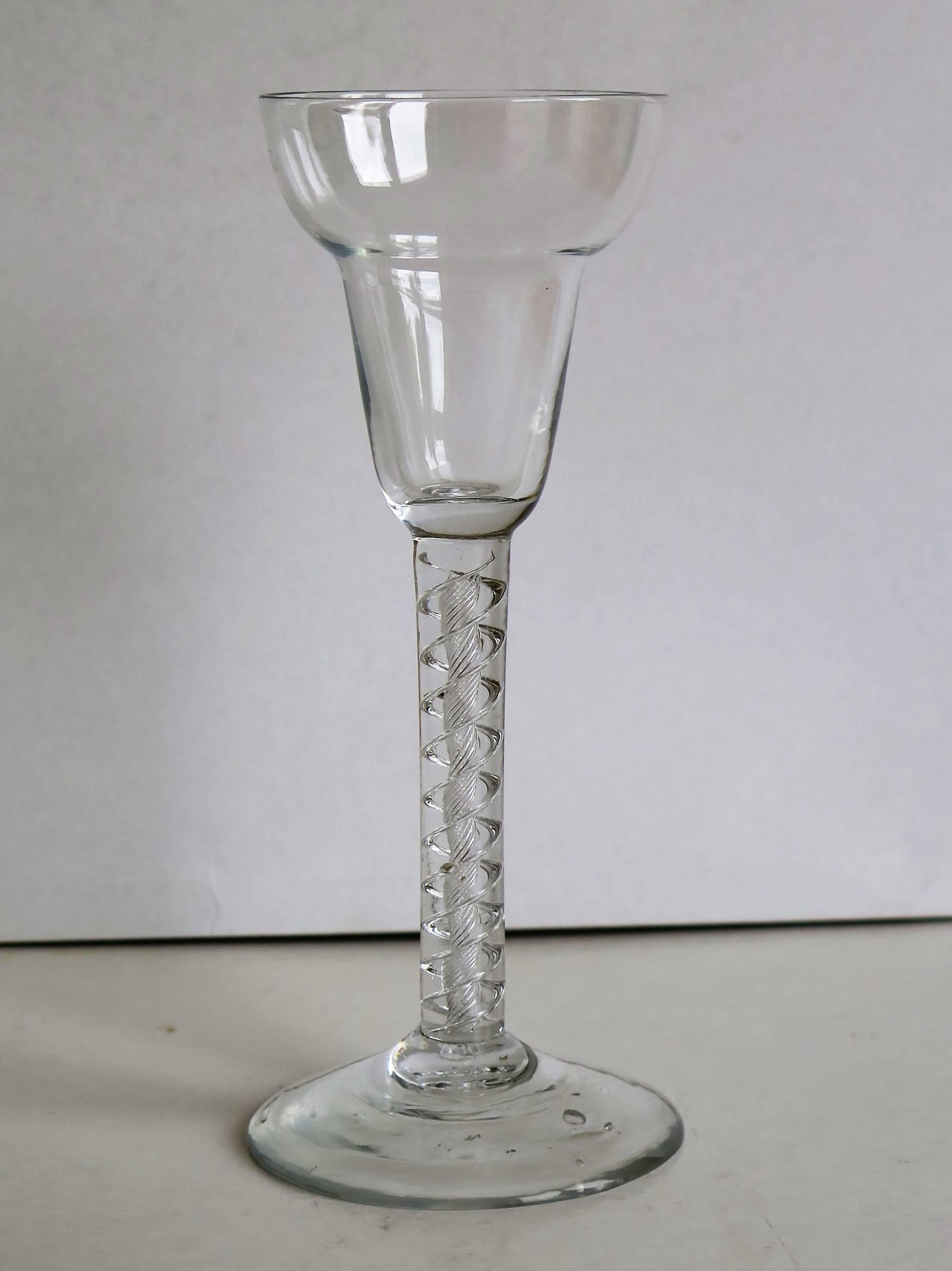 This is a superb English, mid-Georgian, Handblown, wine drinking glass, with a 'Mercury' Air Twist stem and a rare bowl shape, dating to the middle of the 18th century George 11nd period, Circa 1750 / 1755.

These glasses are very collectable.

It