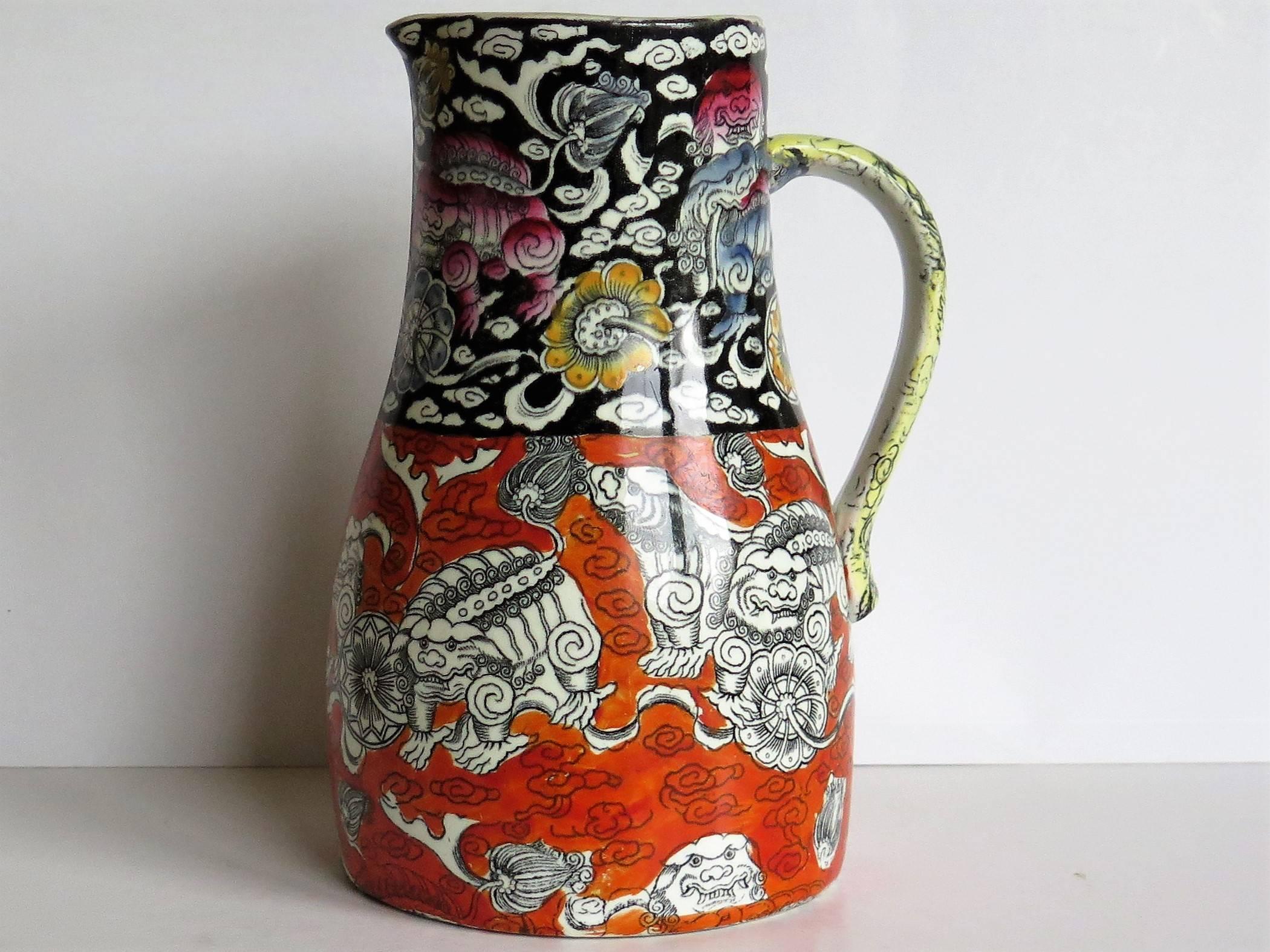 This is a rare shape Jug by Mason's Ironstone pottery, in the striking Bandana pattern, made in the mid-19th century, Circa 1840. 

The jug is hand decorated over a transfer printed pattern with the striking chinoiserie influenced Bandana pattern in