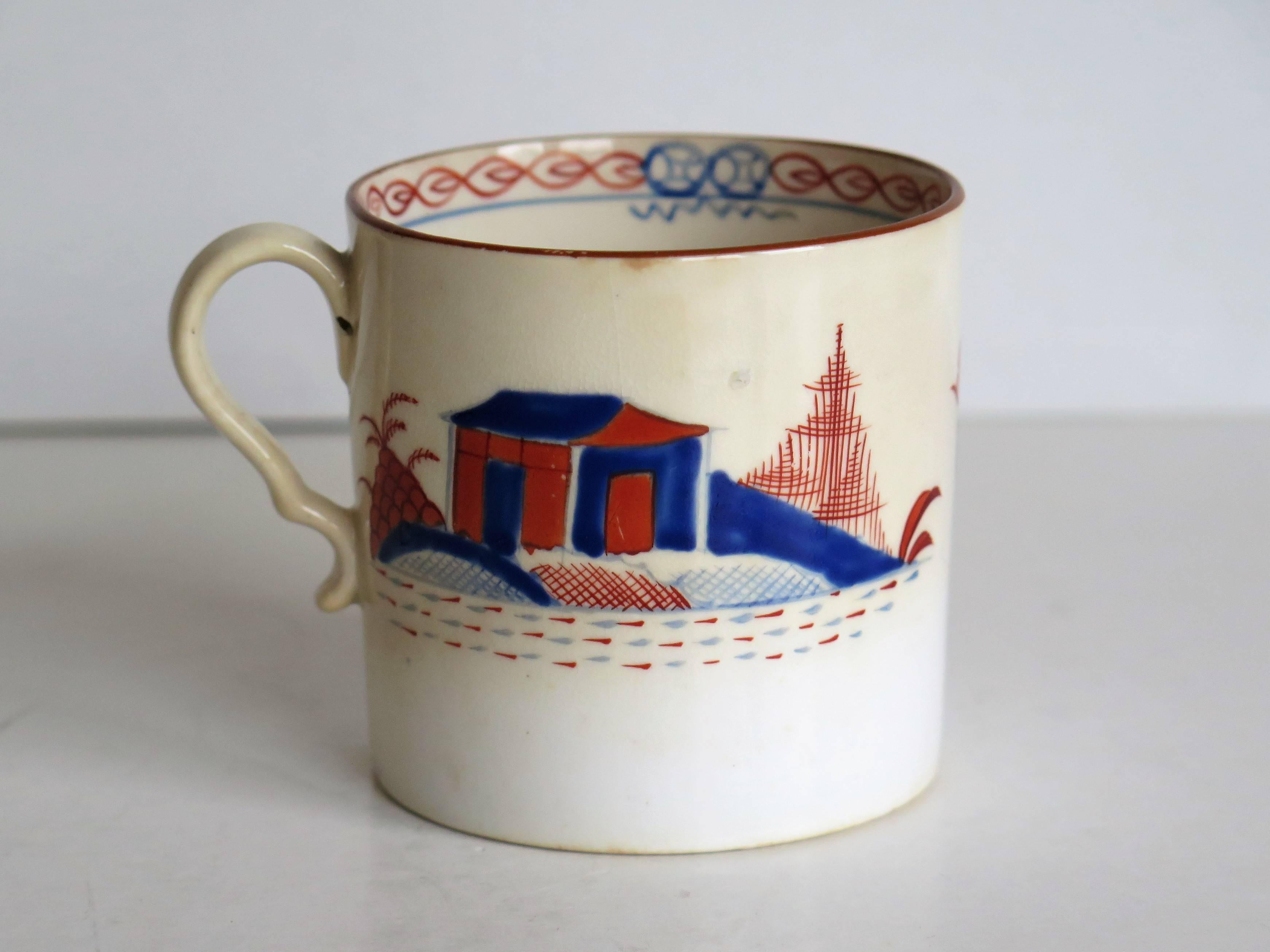 This is a good English Spode porcelain coffee can (cup) from the George 111rd period, very early in the 19th century.

The coffee can is not marked on the base but the can has the pronounced kick to the lower attachment of the handle which is