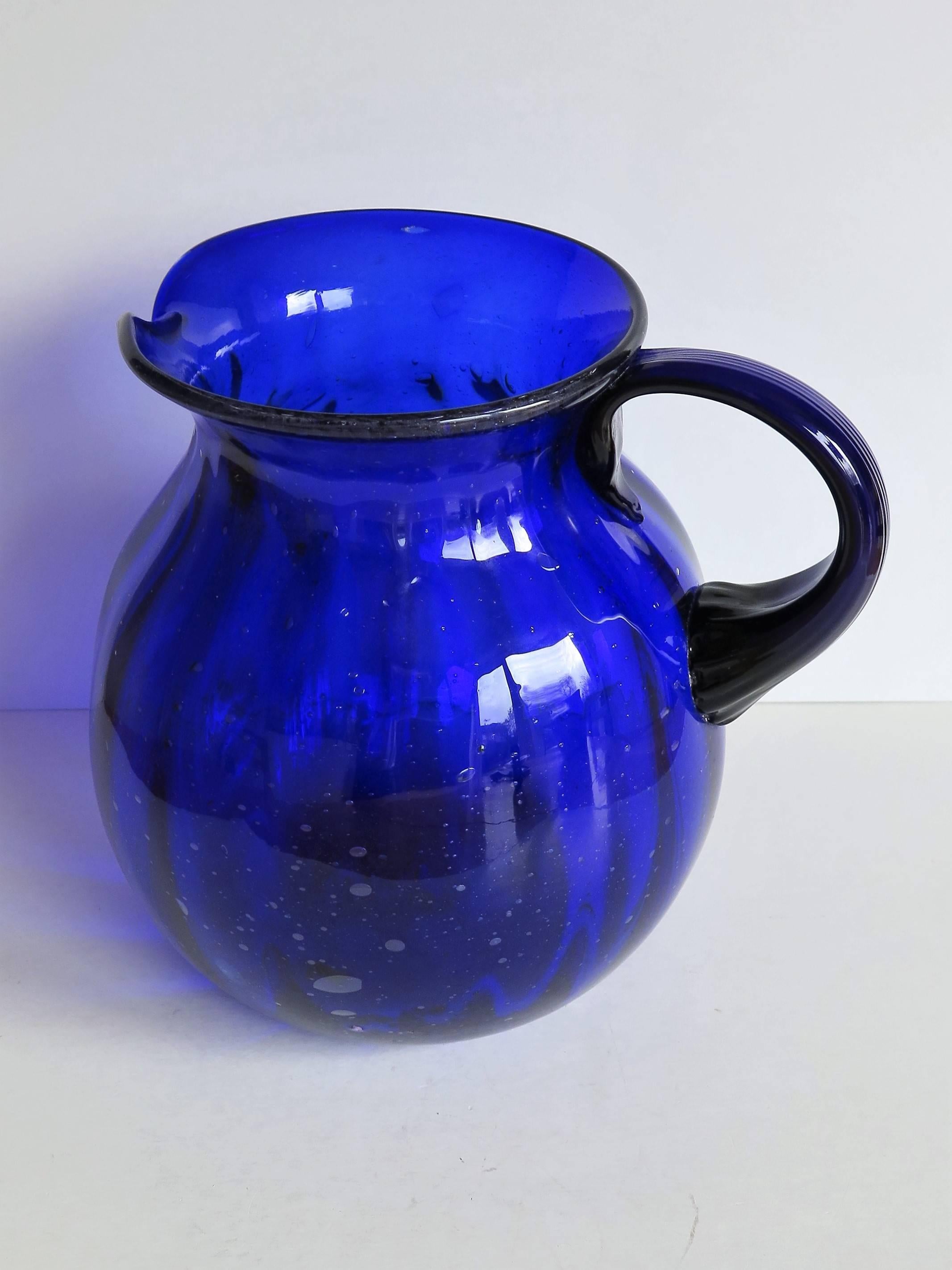 blue glass pitcher