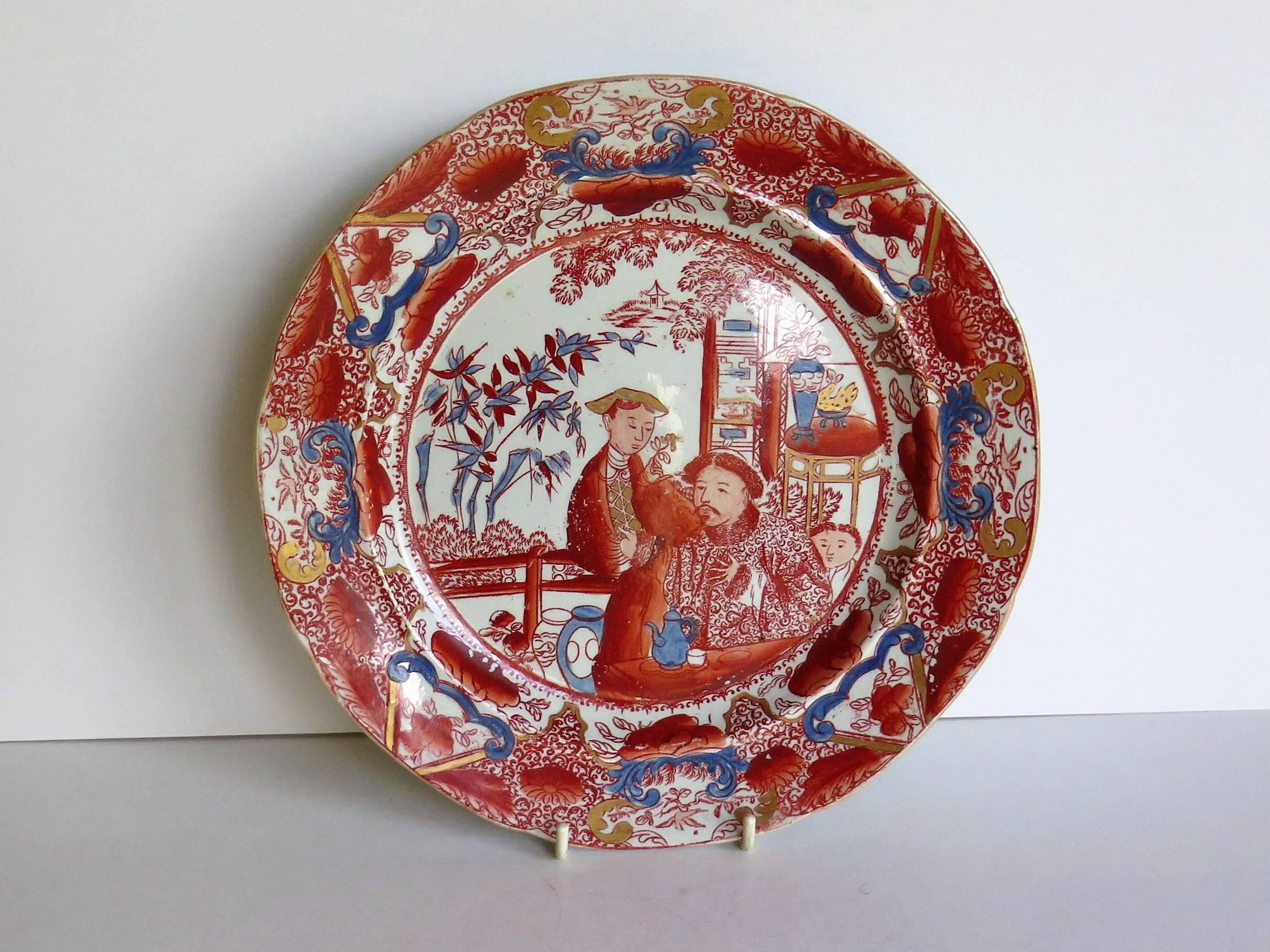 This Ironstone pottery dinner plate was made by the Mason's factory at Lane Delph, Staffordshire, England and is decorated in the Mandarin Pattern with the distinctive red colorway which is very rare.

The design is one of Mason's chinoiserie