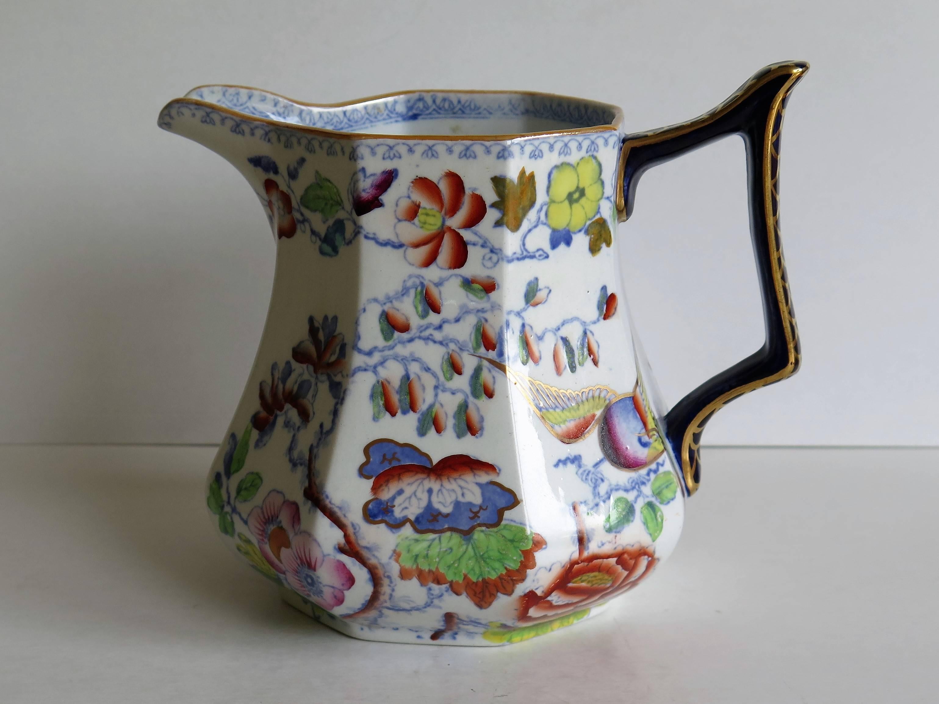 This is a very good mid size jug or pitcher by Mason's Ironstone, England, circa 1870.

The jug has an octagonal form in a shape that is not often seen and with an angular loop handle. 

This jug has one of the very decorative oriental,