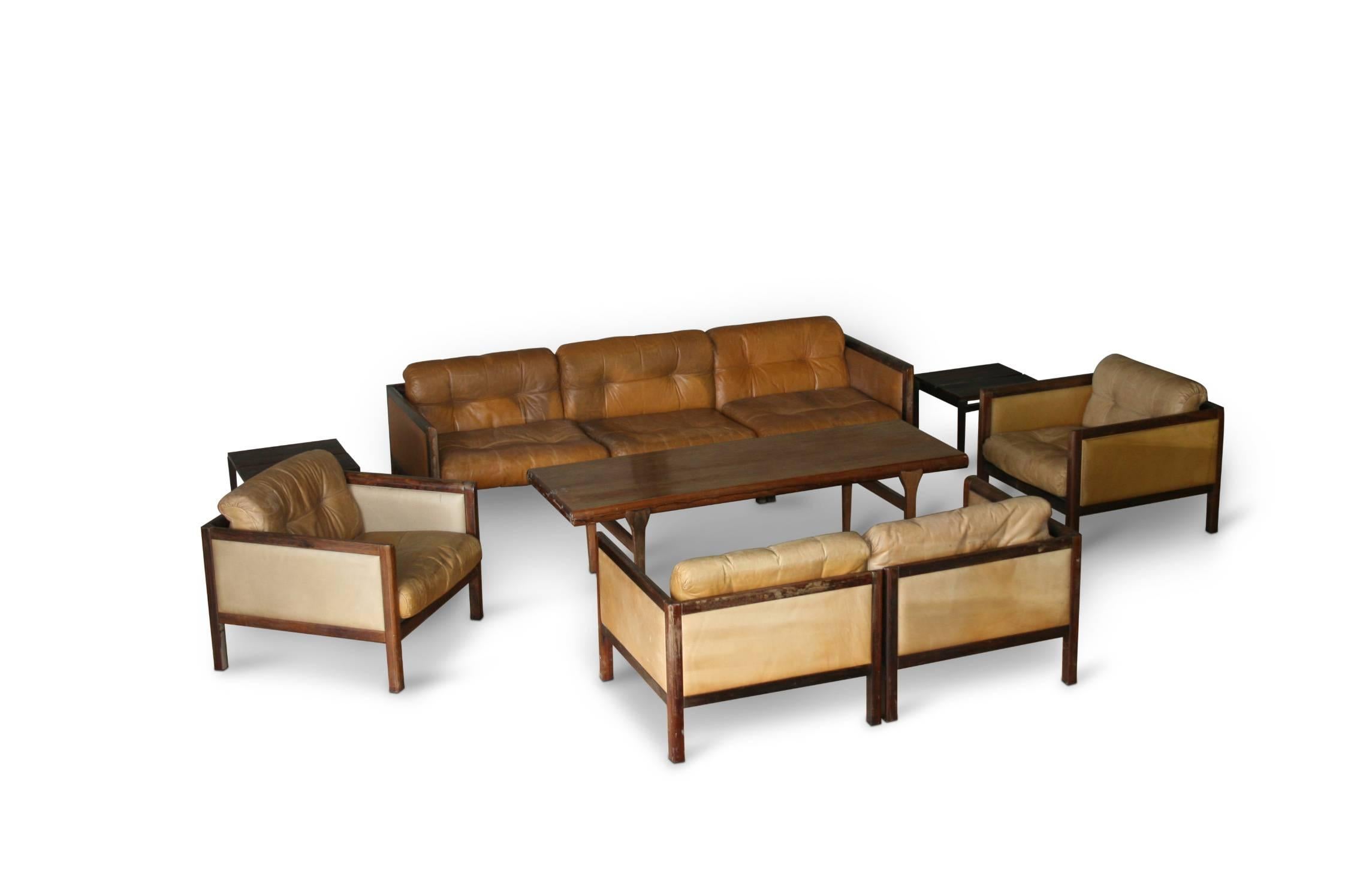Comprising a three-seat sofa, two-seat sofa and a pair of armchairs, this suite was designed by Illum Wikkelso in 1968 for Holger Christiansen. Illum Wikkelso designed a number of well-known lounge furniture pieces for Holger Christiansen. However,